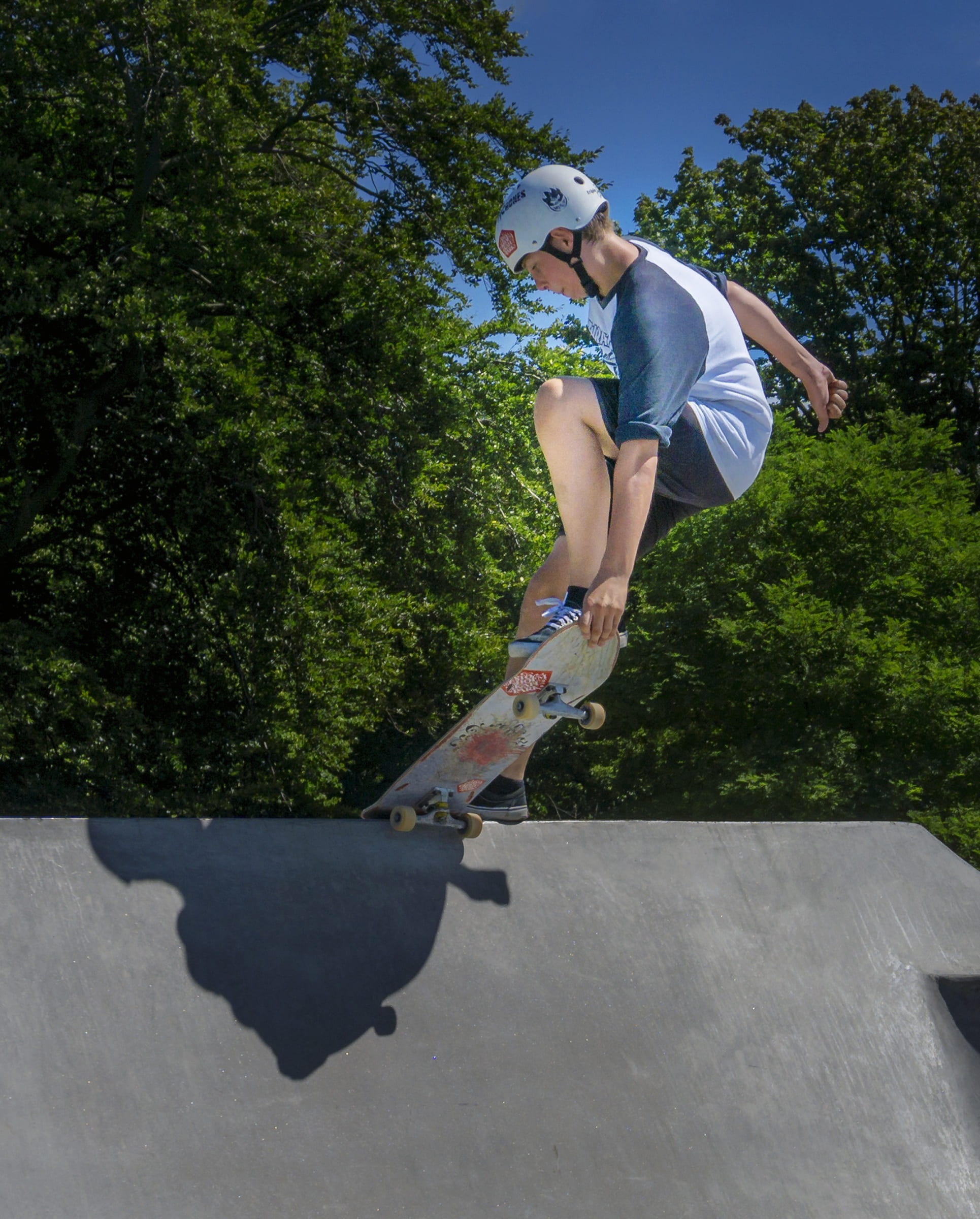 adult, train, variety, skateboard park, human, plant, sunlight, 1080P, mid-air, outdoors, board, sports equipment, funsport, jump, fitness, skateboard, Phone HD Wallpaper