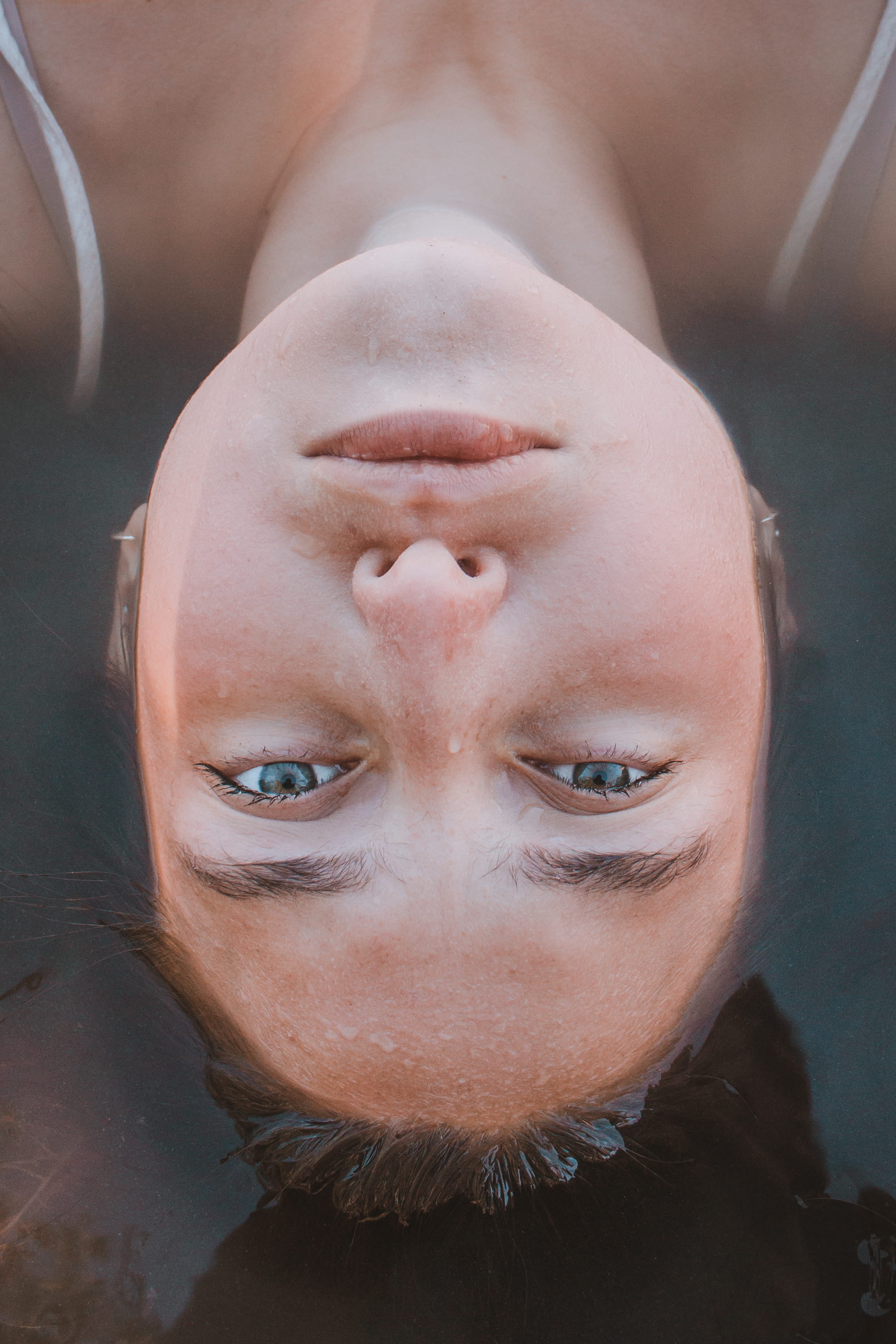 lying on back, eyes closed, caucasian, water, young adult, lying, top, female, wet, front view, real people, upside down, closeup, one person, lying down, Phone HD Wallpaper