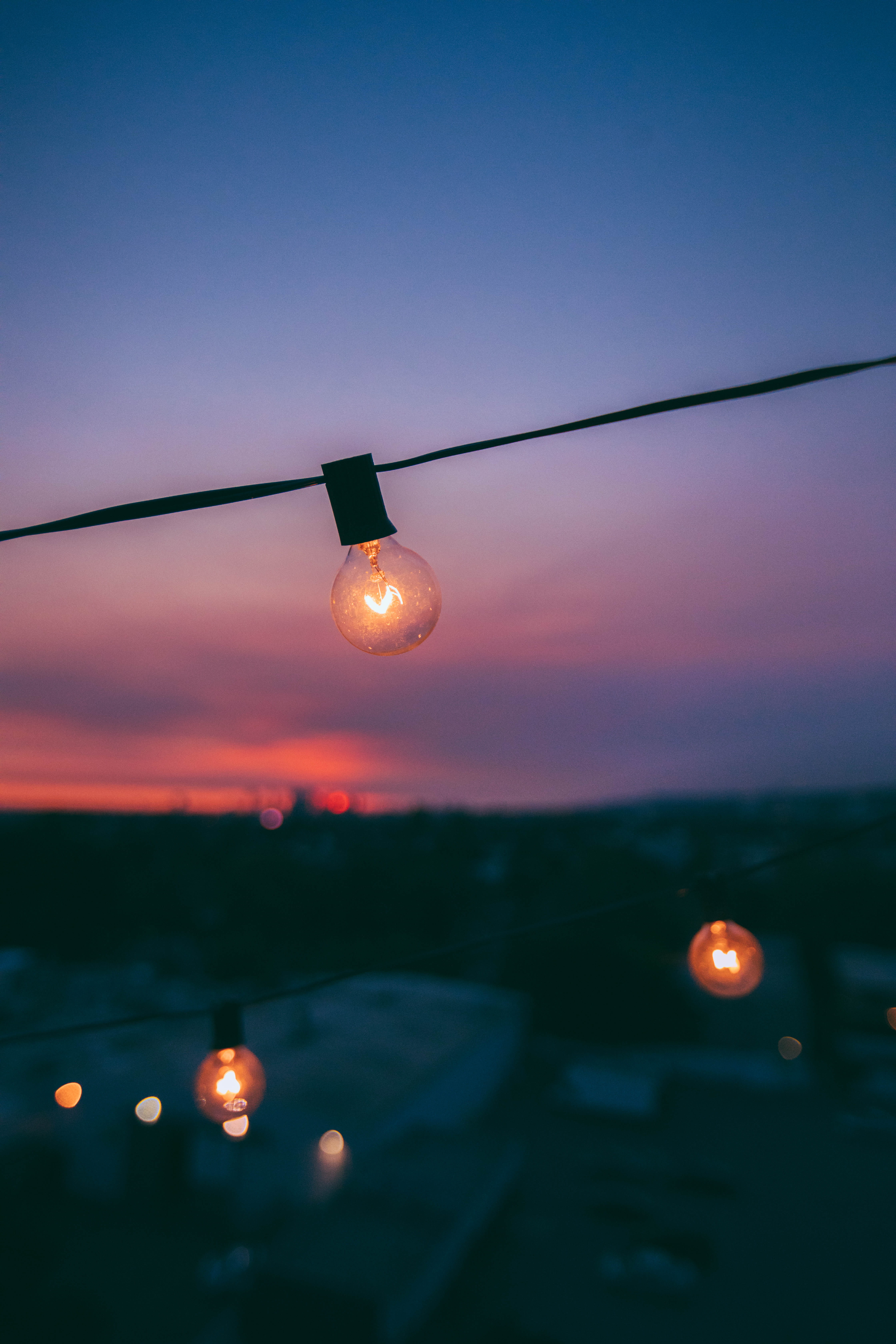 orange color, light bulb, outdoors, bulb, no people, lighting equipment, nature, lights, black, illuminated, light, decoration, close-up, string, sunrise, Phone HD Wallpaper