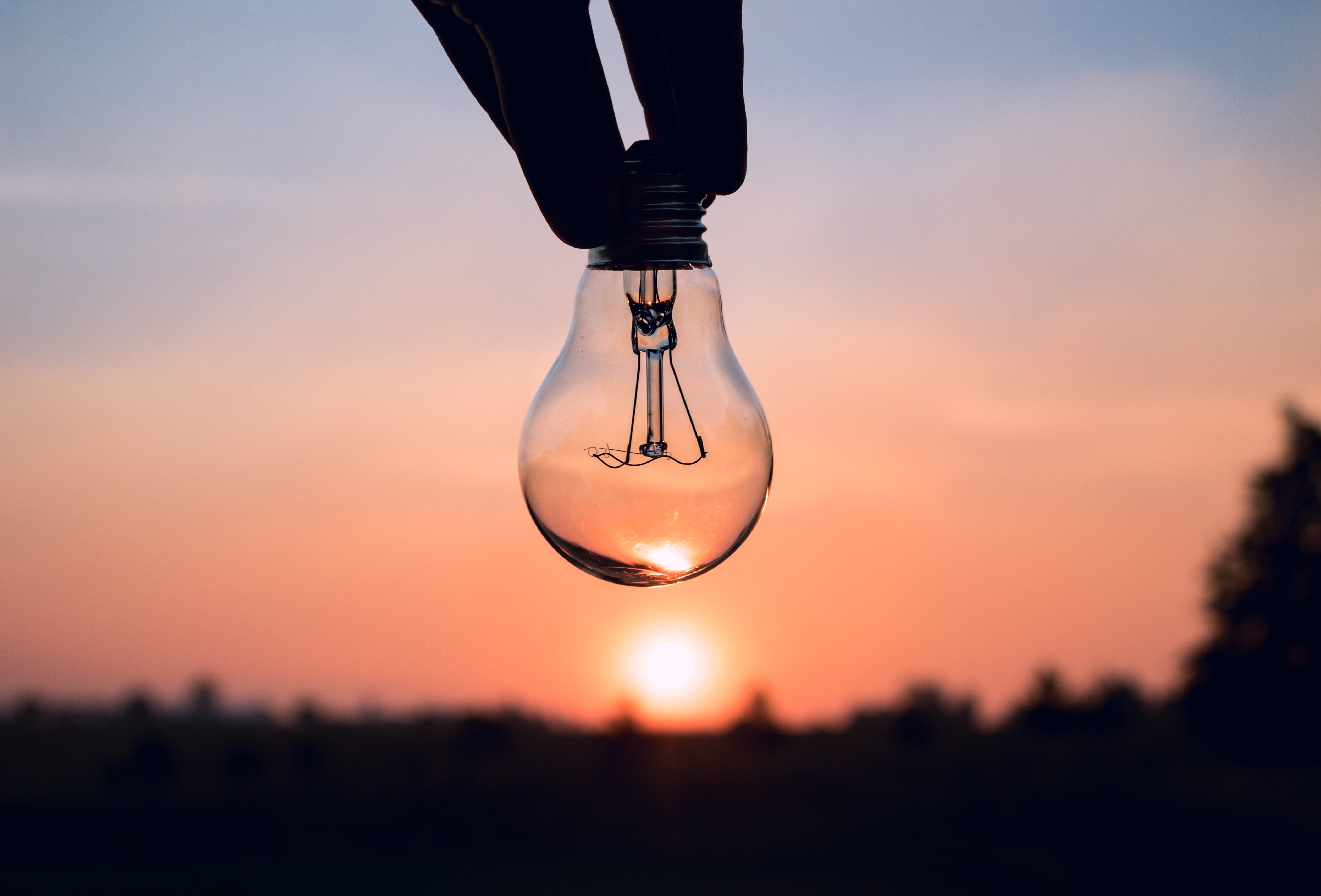 electricity, unrecognizable person, sunset, light Bulb, inspiration, business, shiny, glowing, human leg, hand, ideas, focus on foreground, technology, HD Wallpaper