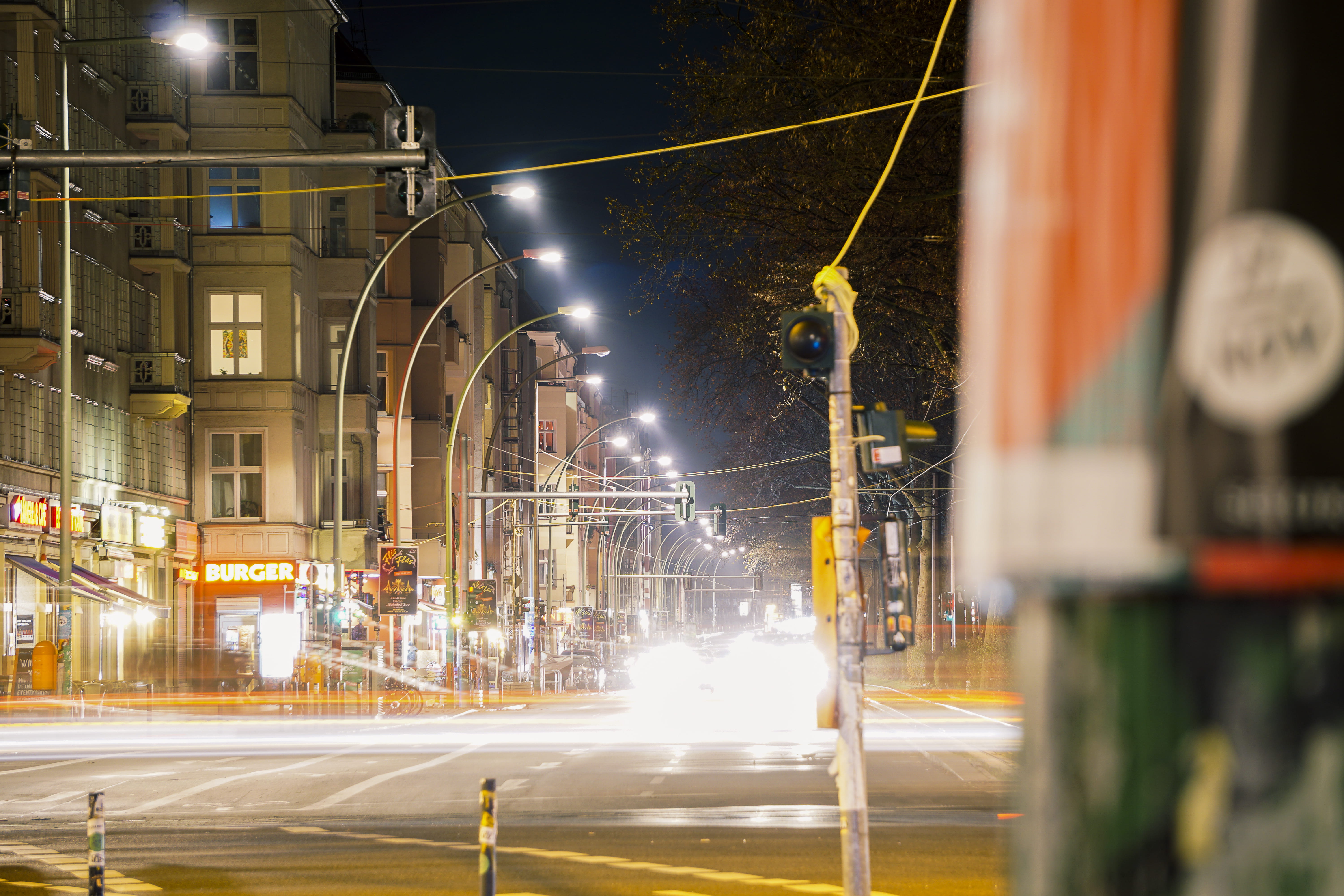 city, city street, nightlight, built structure, roads, nature, sign, light, street, road, germany, long exposure, touristic, frankfurter tor, shops, streetstyle, HD Wallpaper