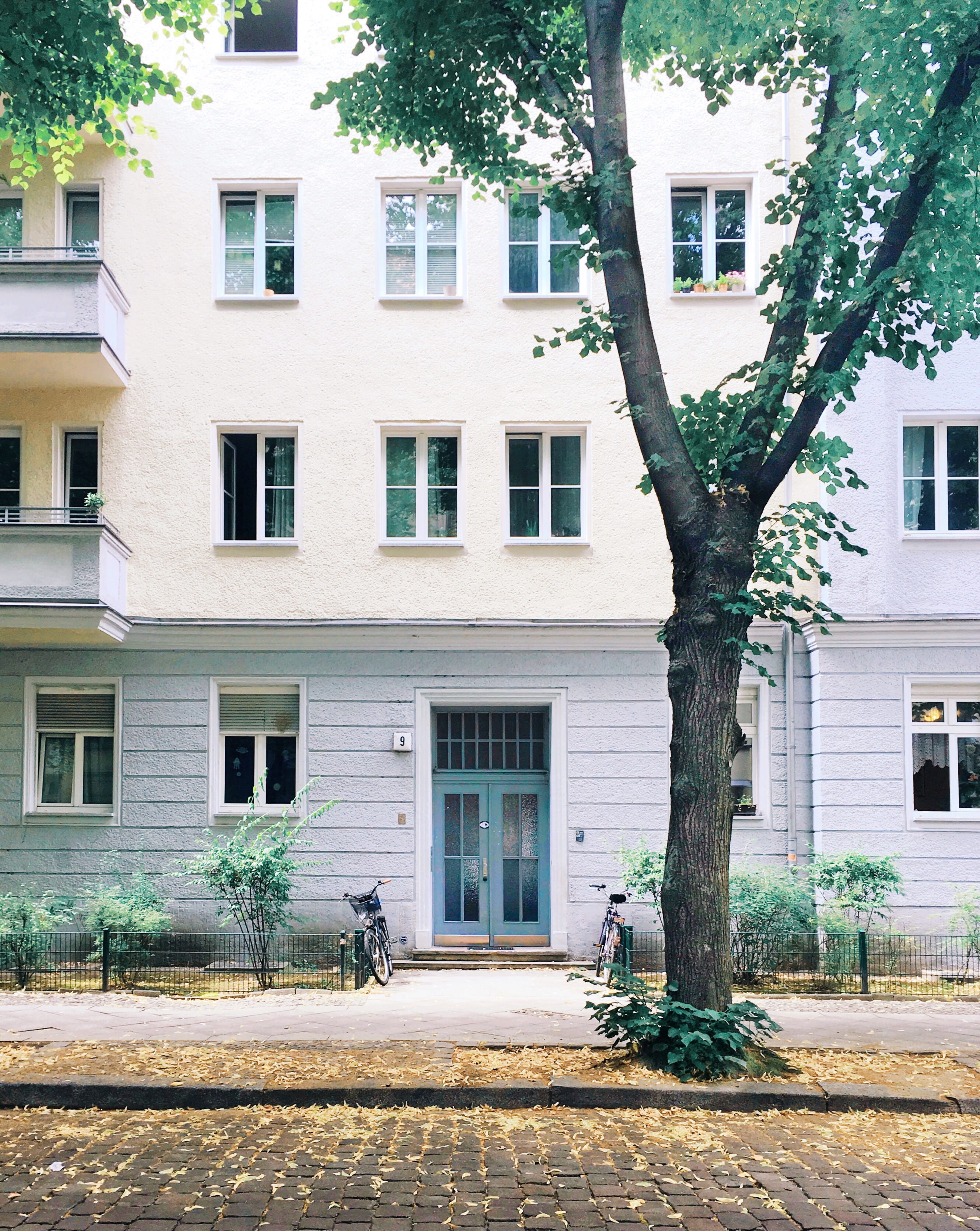 friedrichshain, city, outdoors, parked, housing development, built structure, green, architecture, building, door, bike, footpath, plant, growth, building exterior, Phone HD Wallpaper