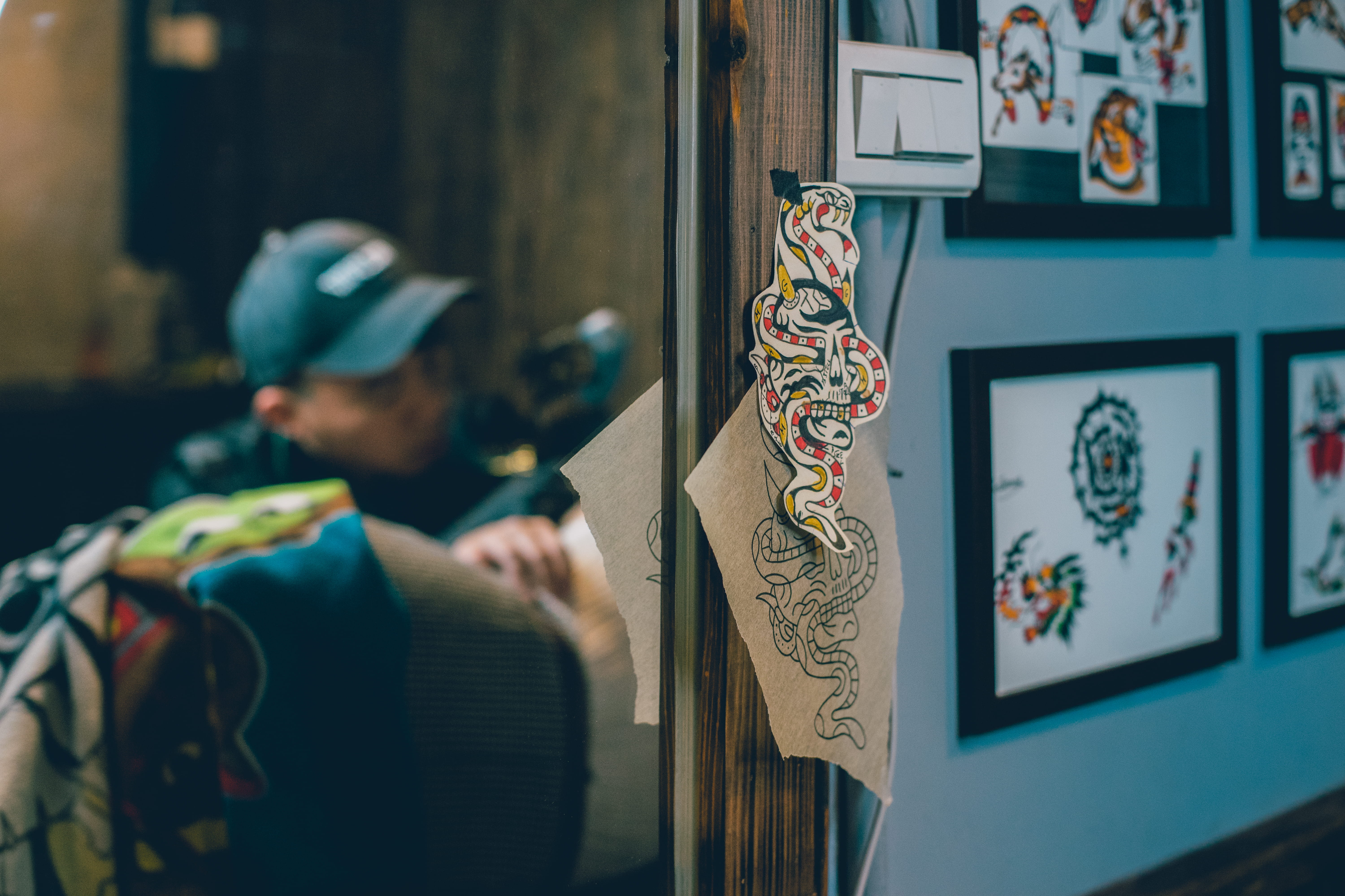 coat, leisure activity, men, one person, shelf, selective, sticker, taipei, representation, hat, communication, picture frame, trademark, human, day, rear view, HD Wallpaper