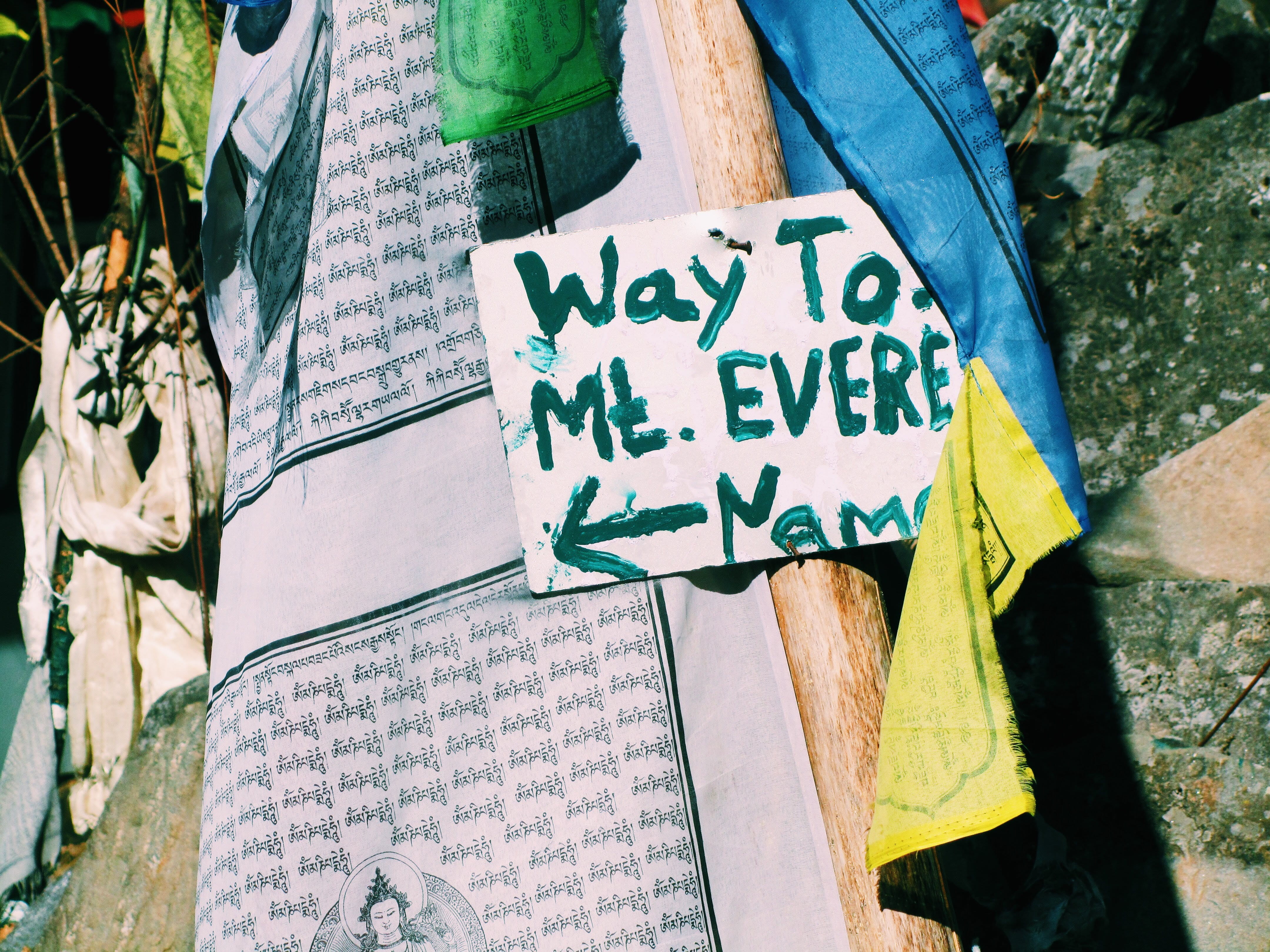 focus on foreground, poster, religion, day, script, close-up, handwriting, signage, crowd, paper, hanging, western script, vessel, non-western script, machine, HD Wallpaper