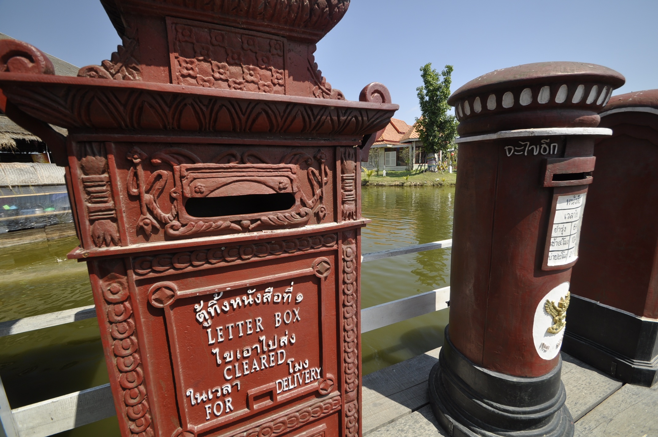 text, public mailbox, water, script, travel destinations, architecture, building exterior, built structure, sky, travel, 1080P, hua hin, non-western script, HD Wallpaper