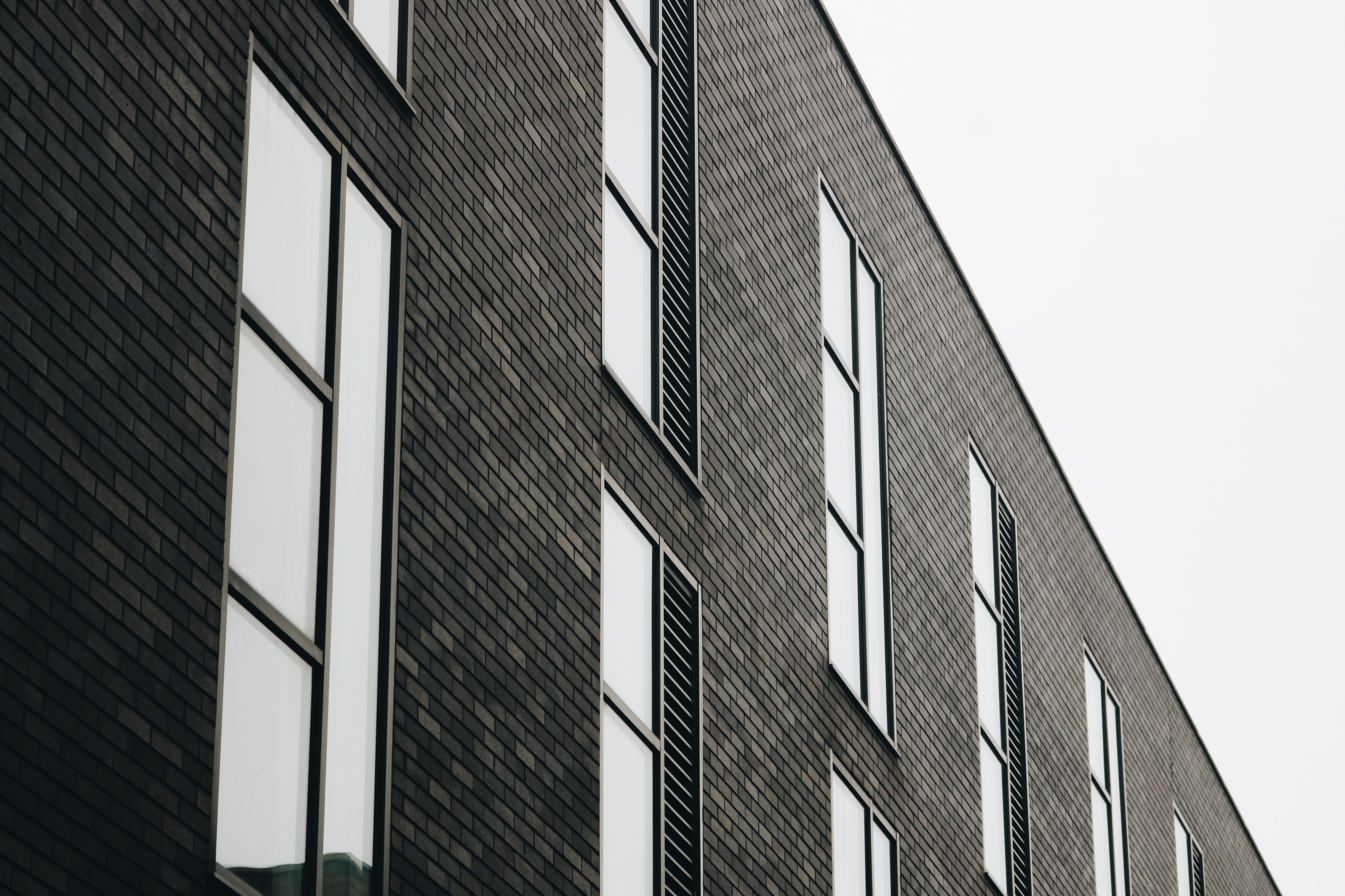condo, simple, low angle view, apartment building, concrete, sky, day, building, manchester, 4K, built structure, clear sky, boundary, modern, fence, high rise, HD Wallpaper