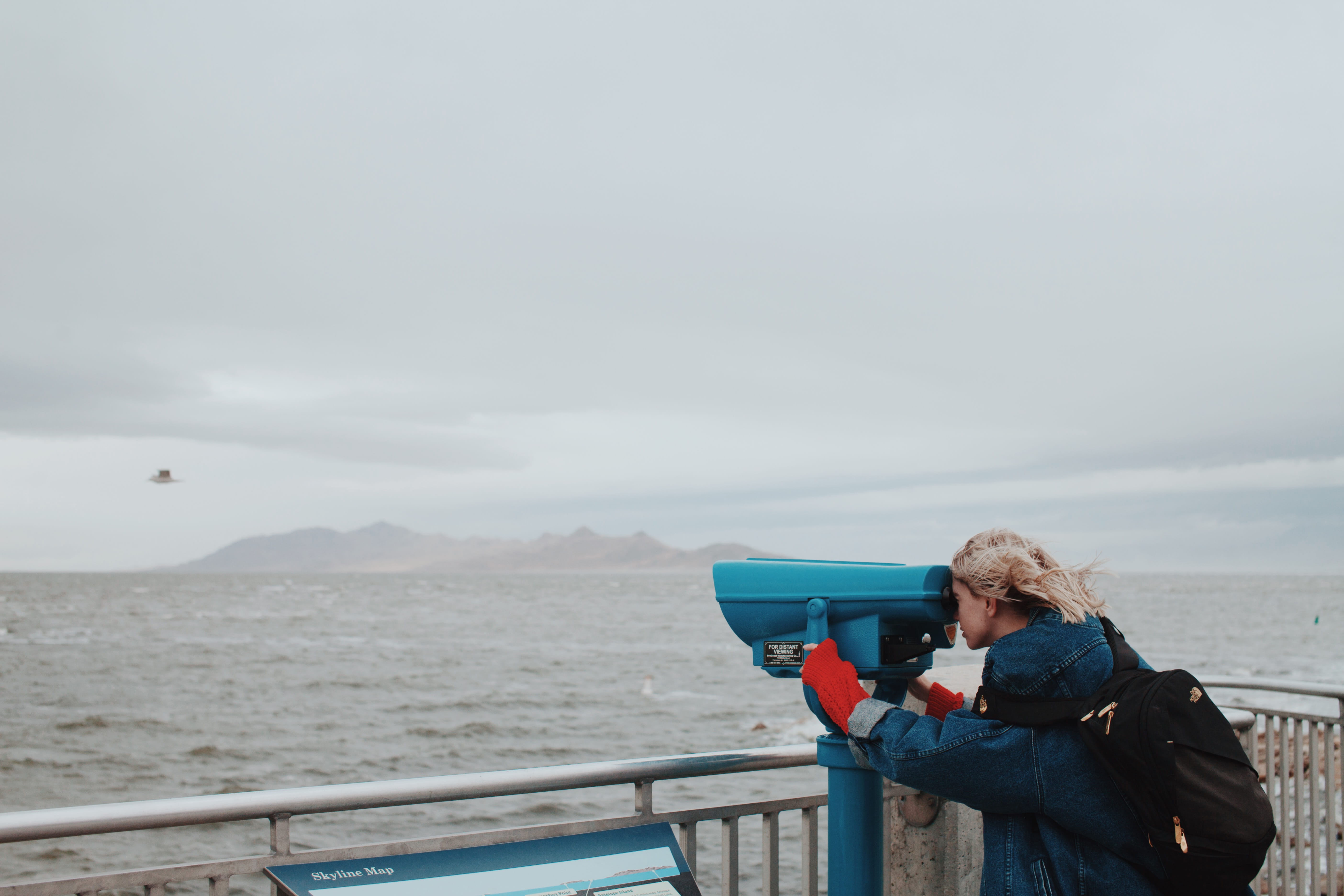 coast, beach, looking through, shore, woman, women, ocean, gray, surveillance, water, earth tone, watching, looking, senior Adult, sky, sand, railing, caucasian Ethnicity, HD Wallpaper