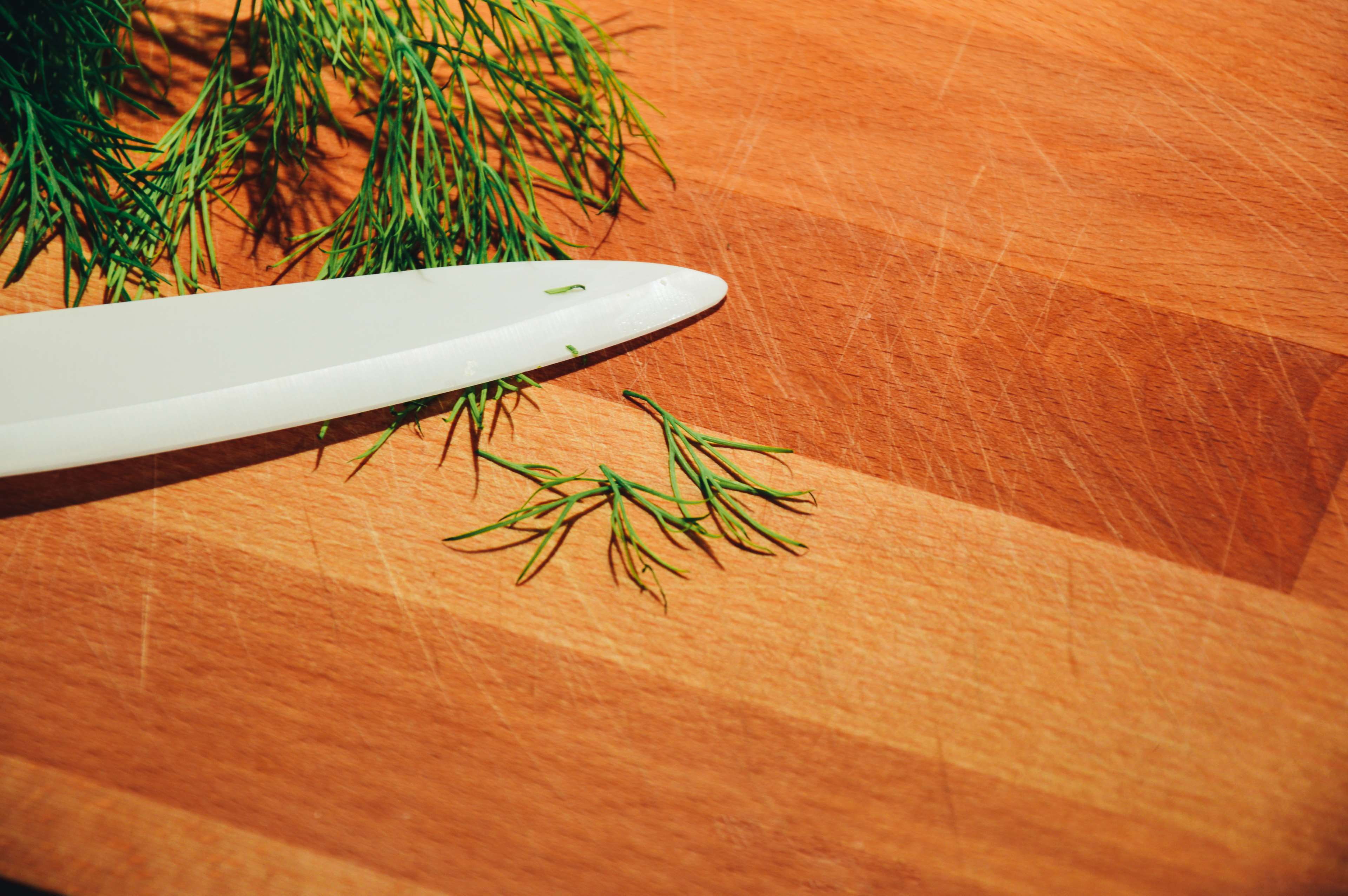 indoors, table, knife, plant part, green color, close-up, herb, day, tree, cutting board, wood - material, plant, growth, dill, no people, 4K, brown, sunlight, HD Wallpaper