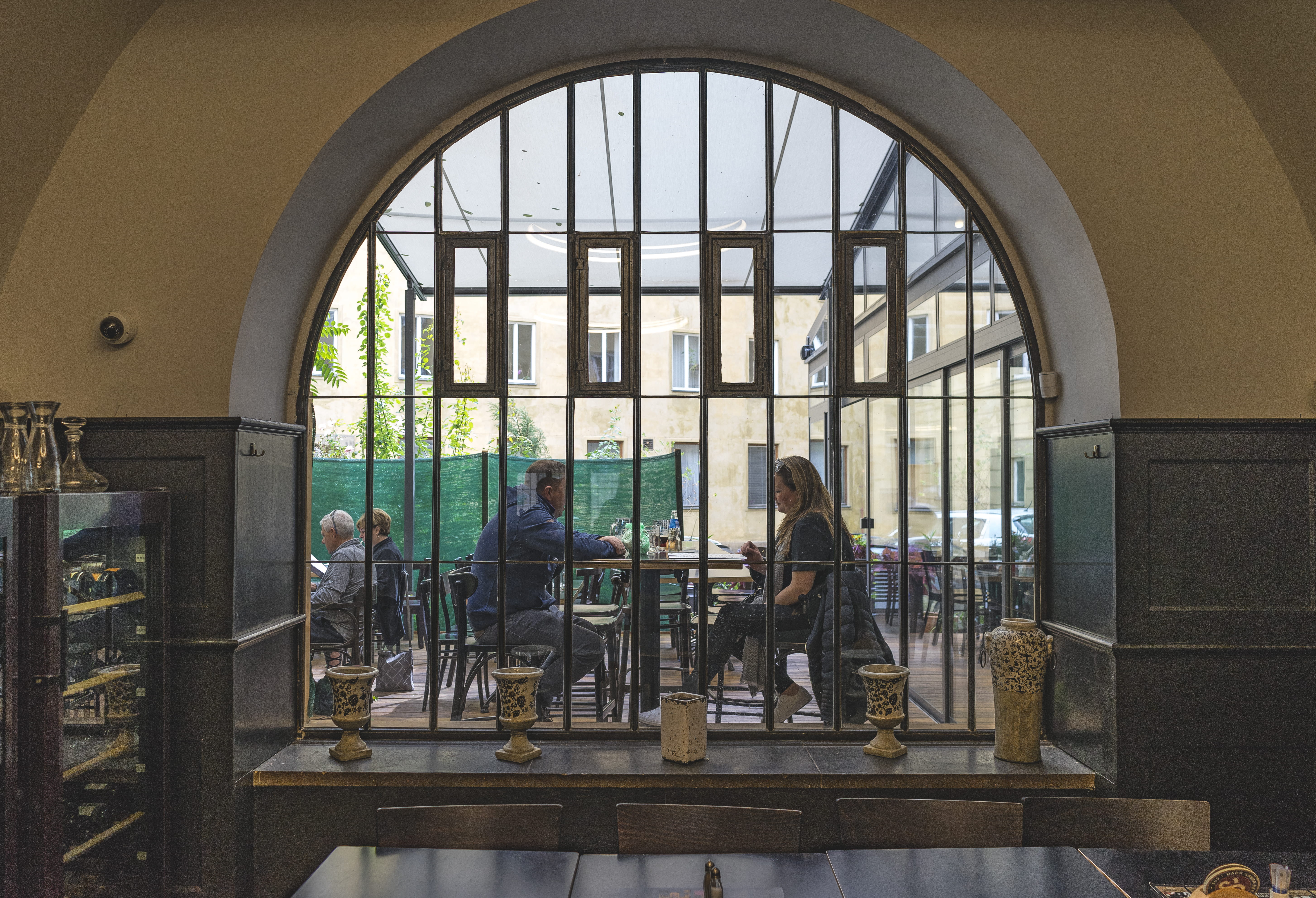 european, architecture, real people, seat, czech, cafe, prague, czechia, leisure activity, 5K, day, men, talk, meeting, diner, window, autumn, full length, HD Wallpaper