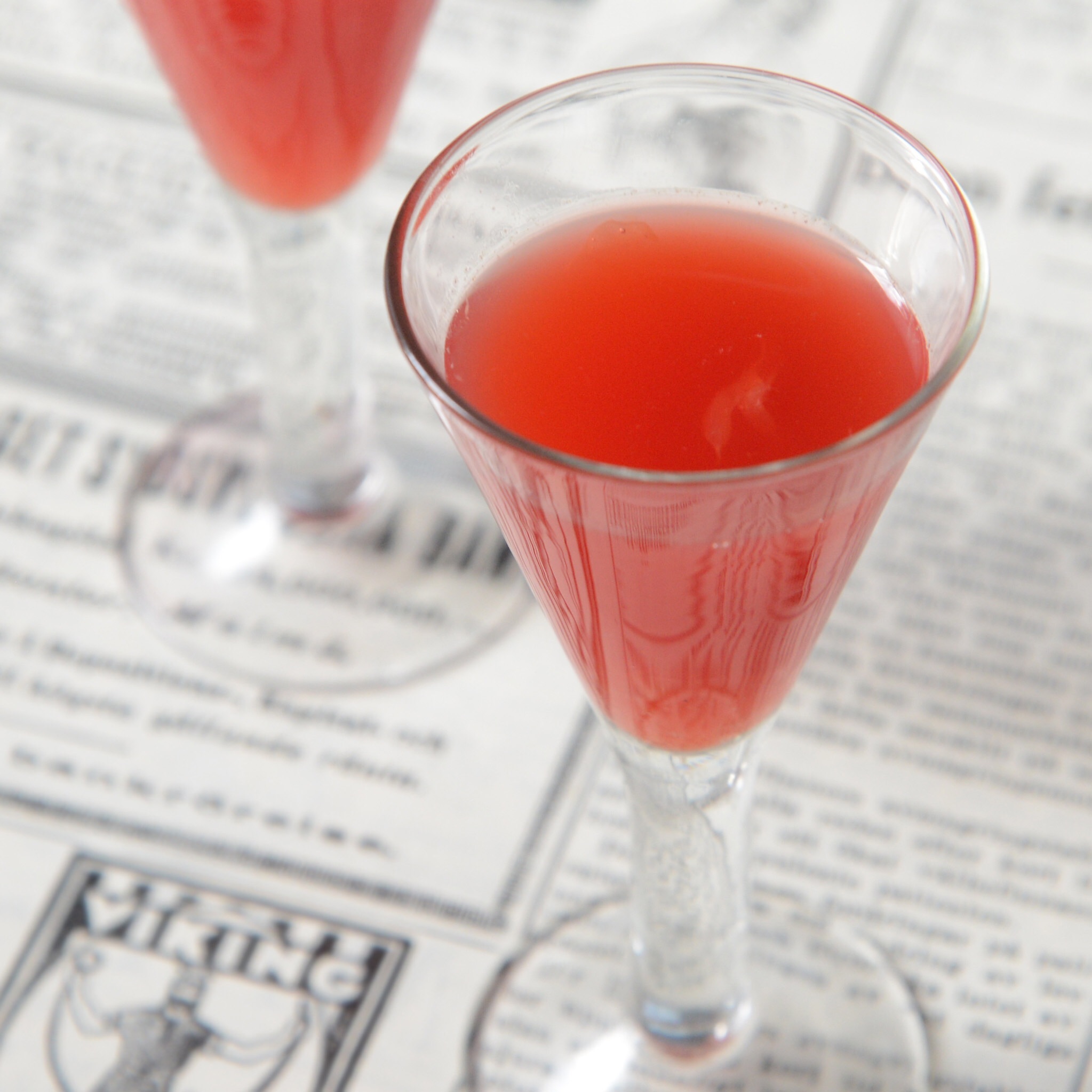 juice, old newspaper, turmeric, blood orange, health, glass, cocktail, focus on foreground, red, refreshment, indoors, martini, close-up, 1080P, alcohol, Phone HD Wallpaper