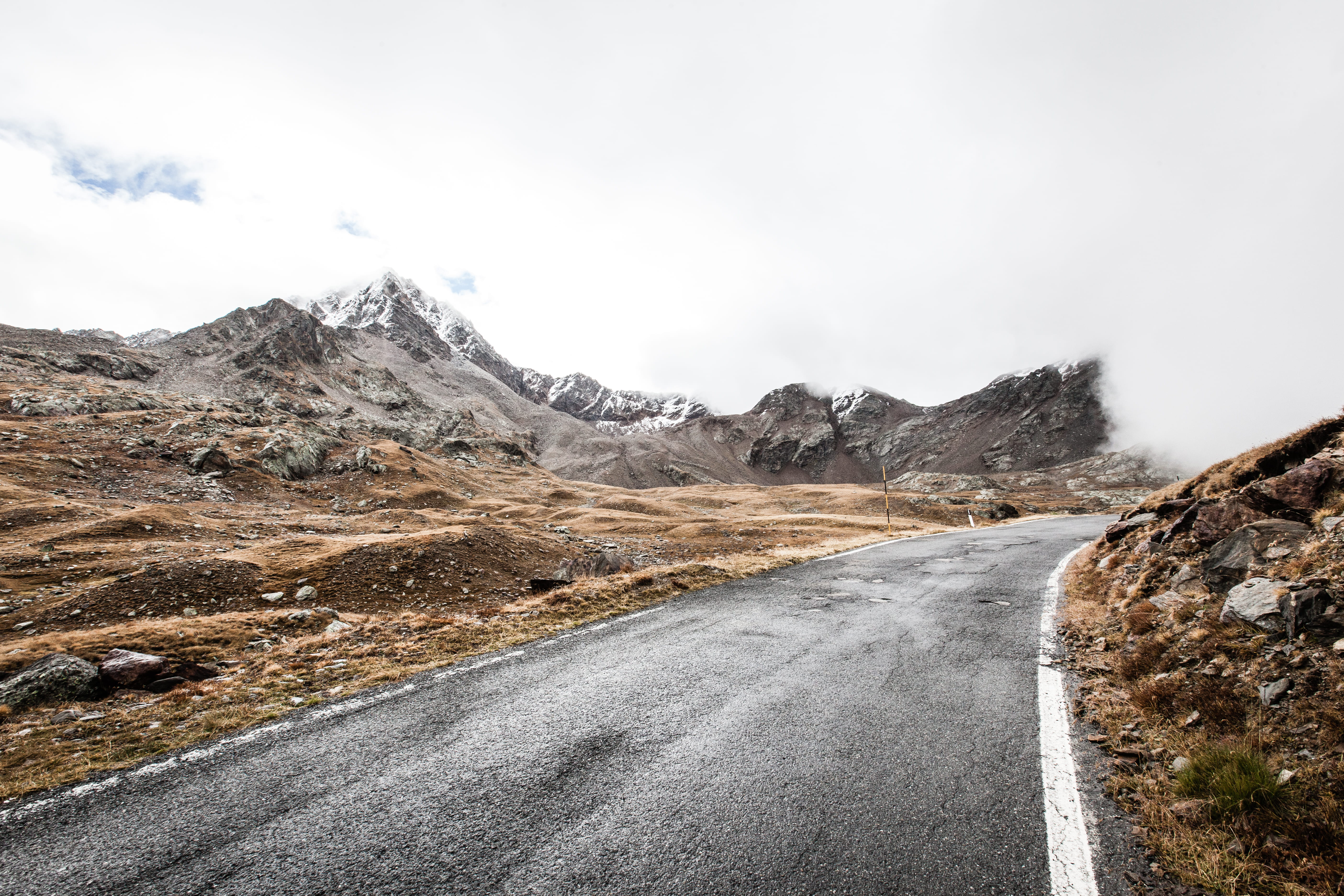 snowcapped mountain, outdoors, asphalt, near, range, lonesome, diminishing perspective, transportation, route, 5K, rock, mountain range, daytime, alp, HD Wallpaper