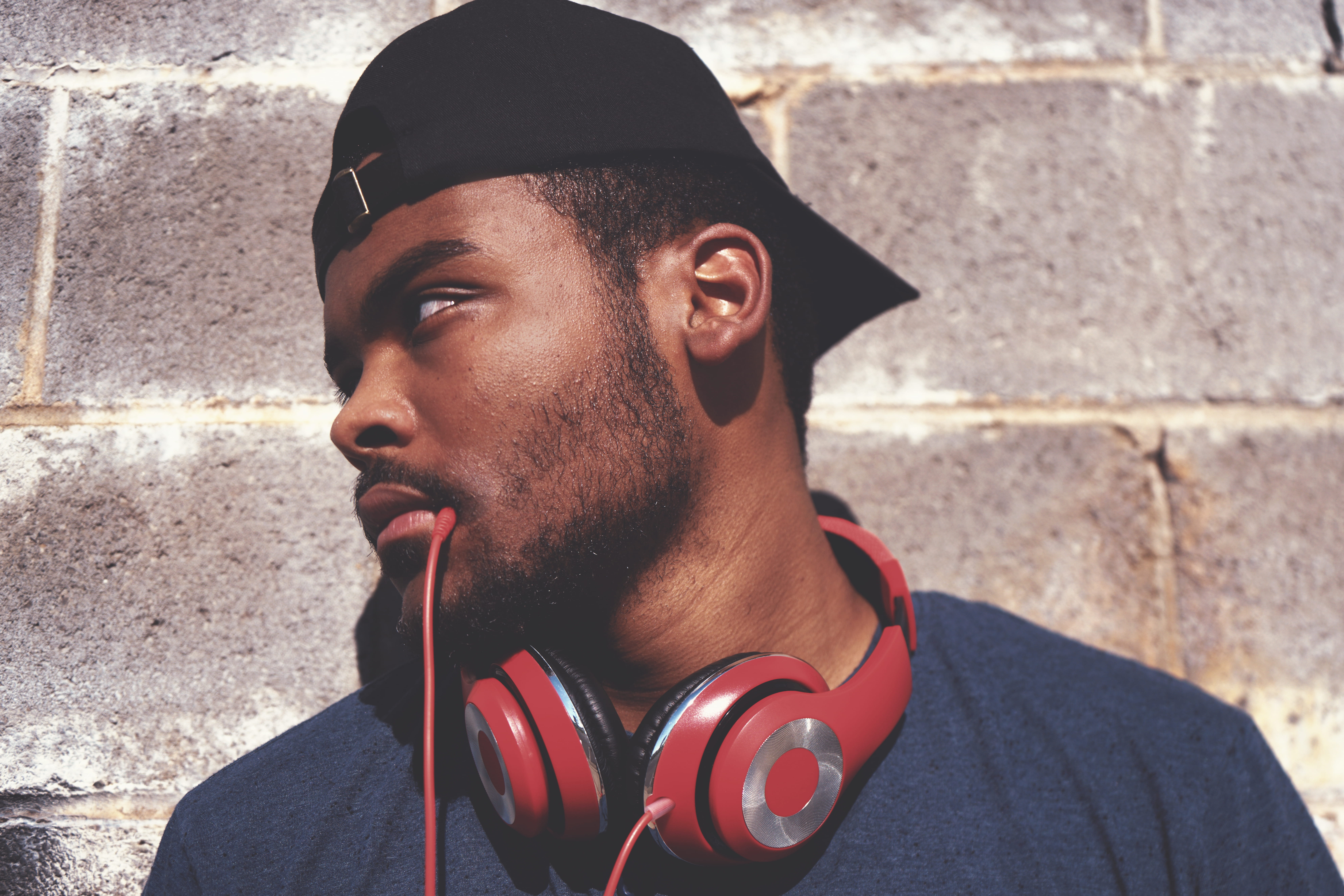 looking, lifestyles, front view, cap, s, african Ethnicity, shirt, beard, day, music, portrait, real people, one Person, guy, one man only, young Men, wall, HD Wallpaper