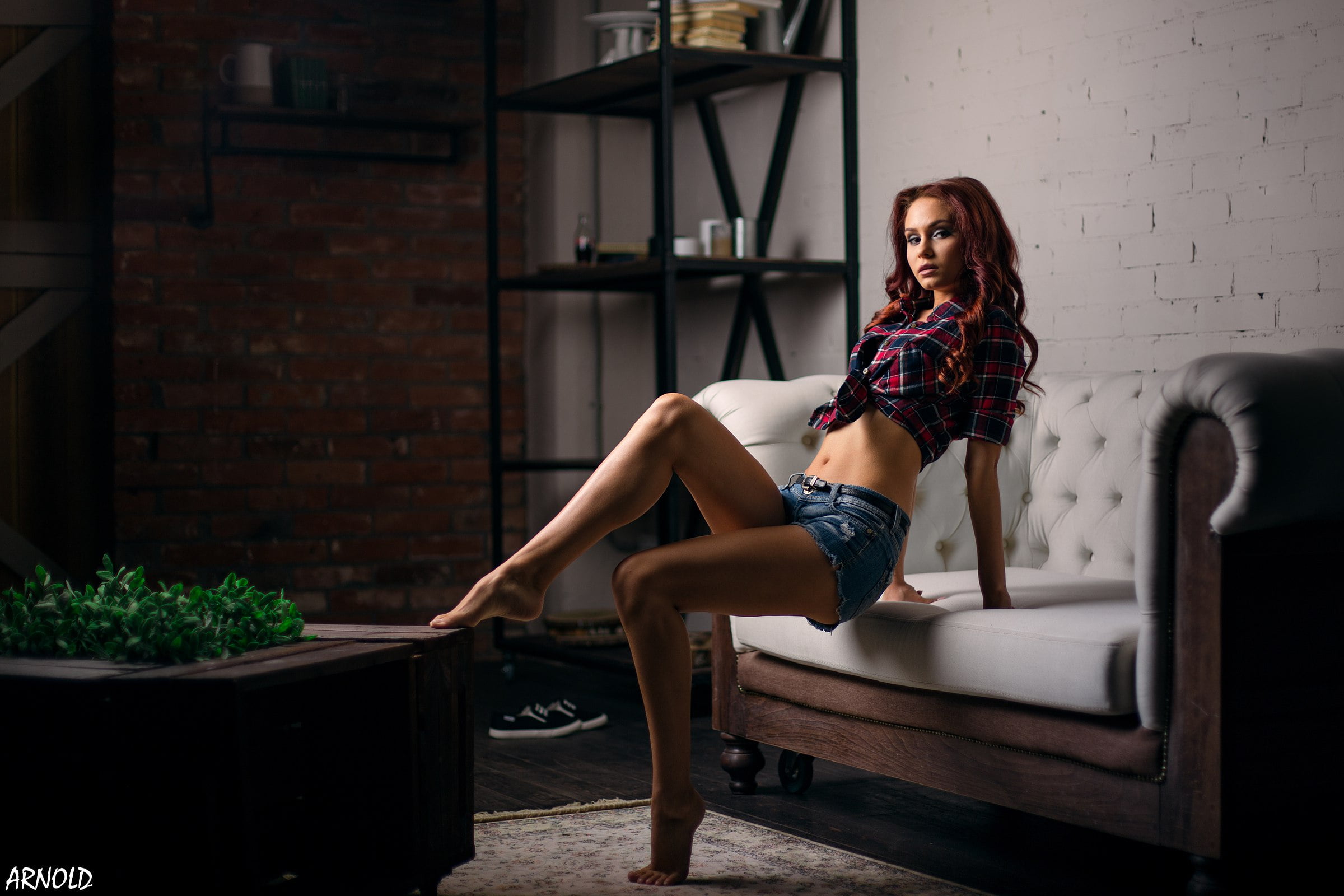 bricks, pink lipstick, tanned, sitting, wall, belly, fashion, dyed hair, 1080P, indoors, lifestyles, plaid shirt, wall - building feature, one person, HD Wallpaper