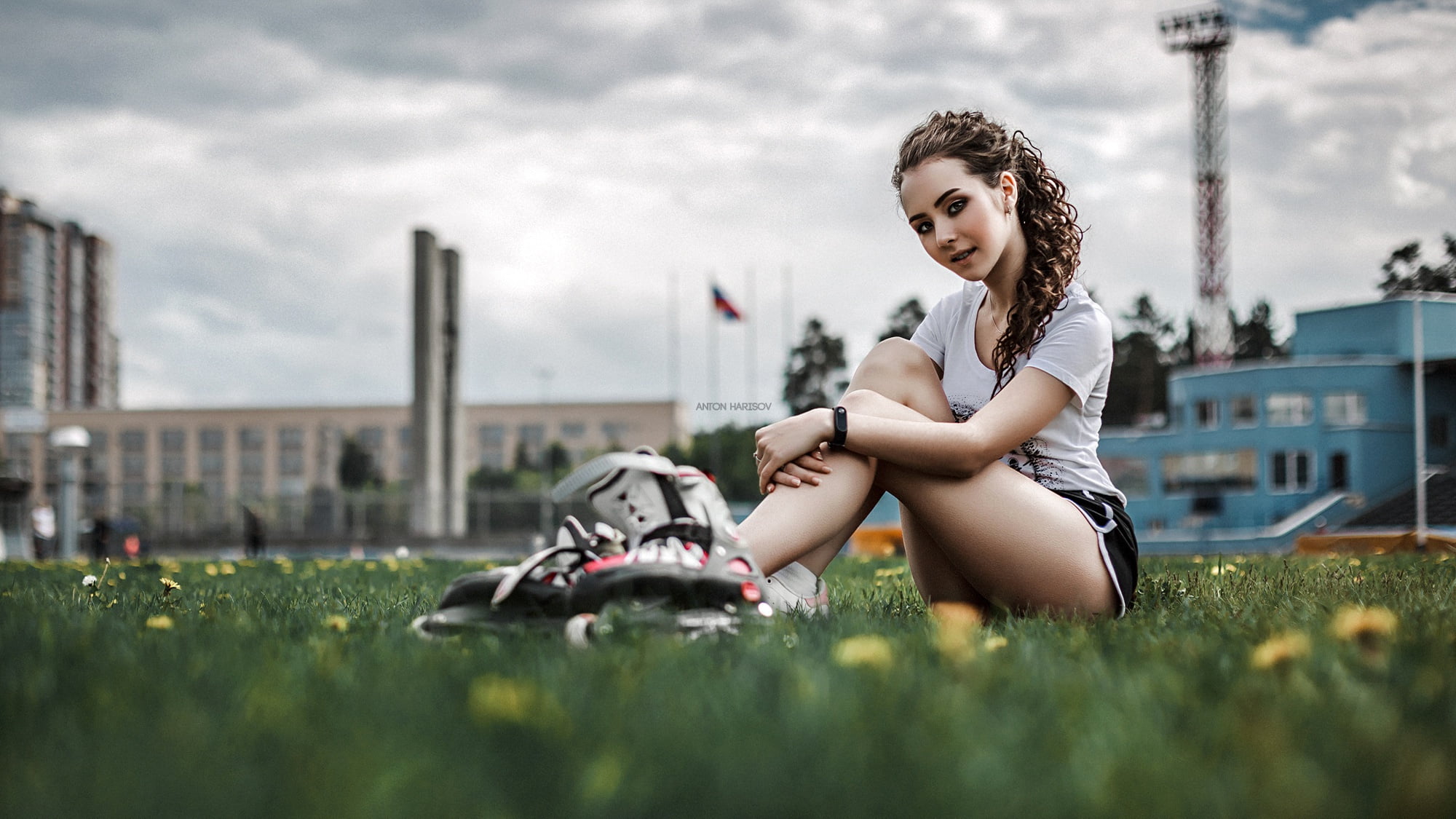 bokeh, legs, 1080P, Anton Harisov, portrait, hairstyle, sneakers, shorts, on the grass, videos, sitting, Elena Borisova, pose, background, beauty, model, HD Wallpaper