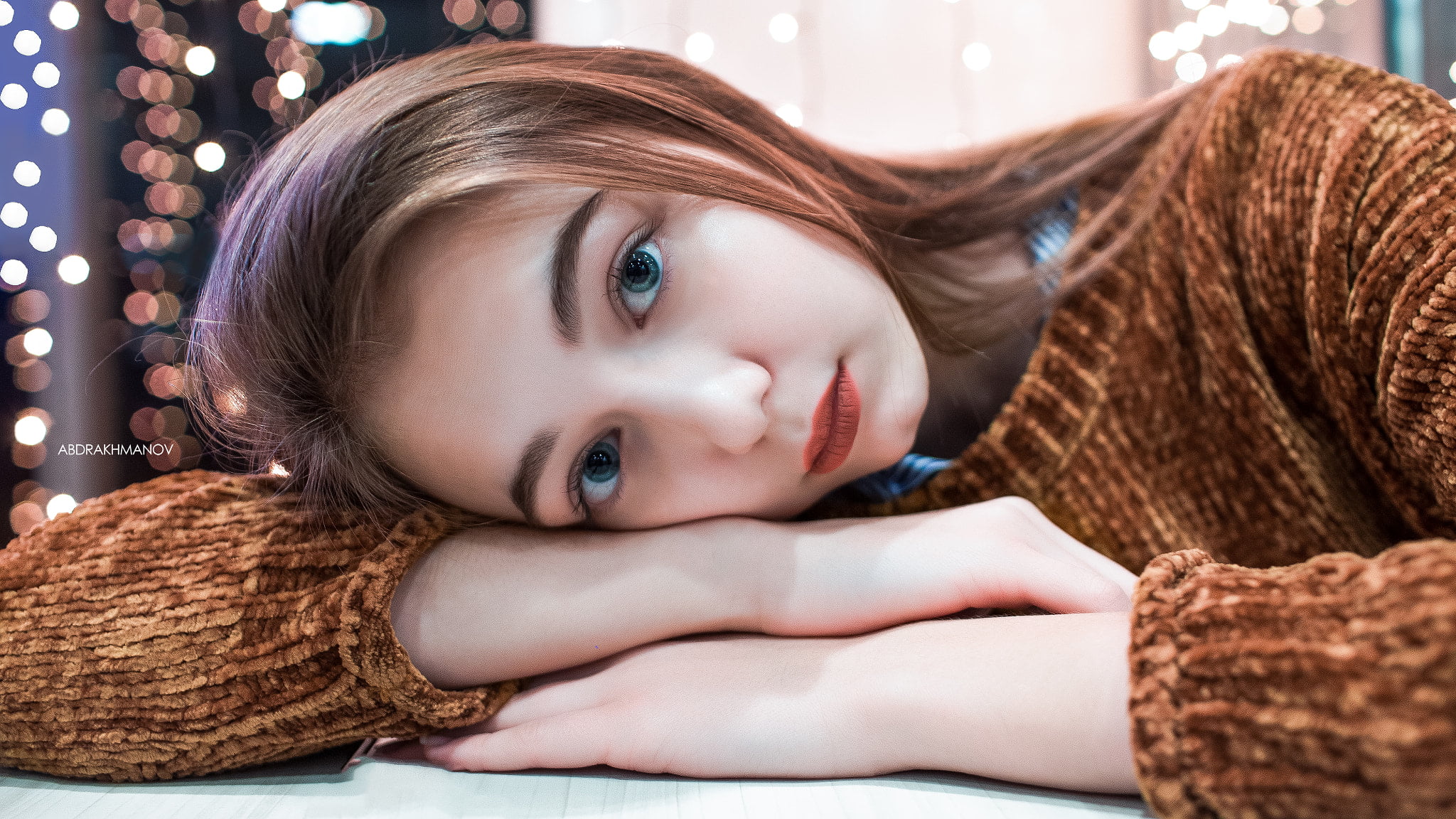 beauty, contemplation, relaxation, furniture, one person, bokeh, lying down, portrait, hairstyle, women, beautiful woman, indoors, sweater, blue eyes, face, HD Wallpaper