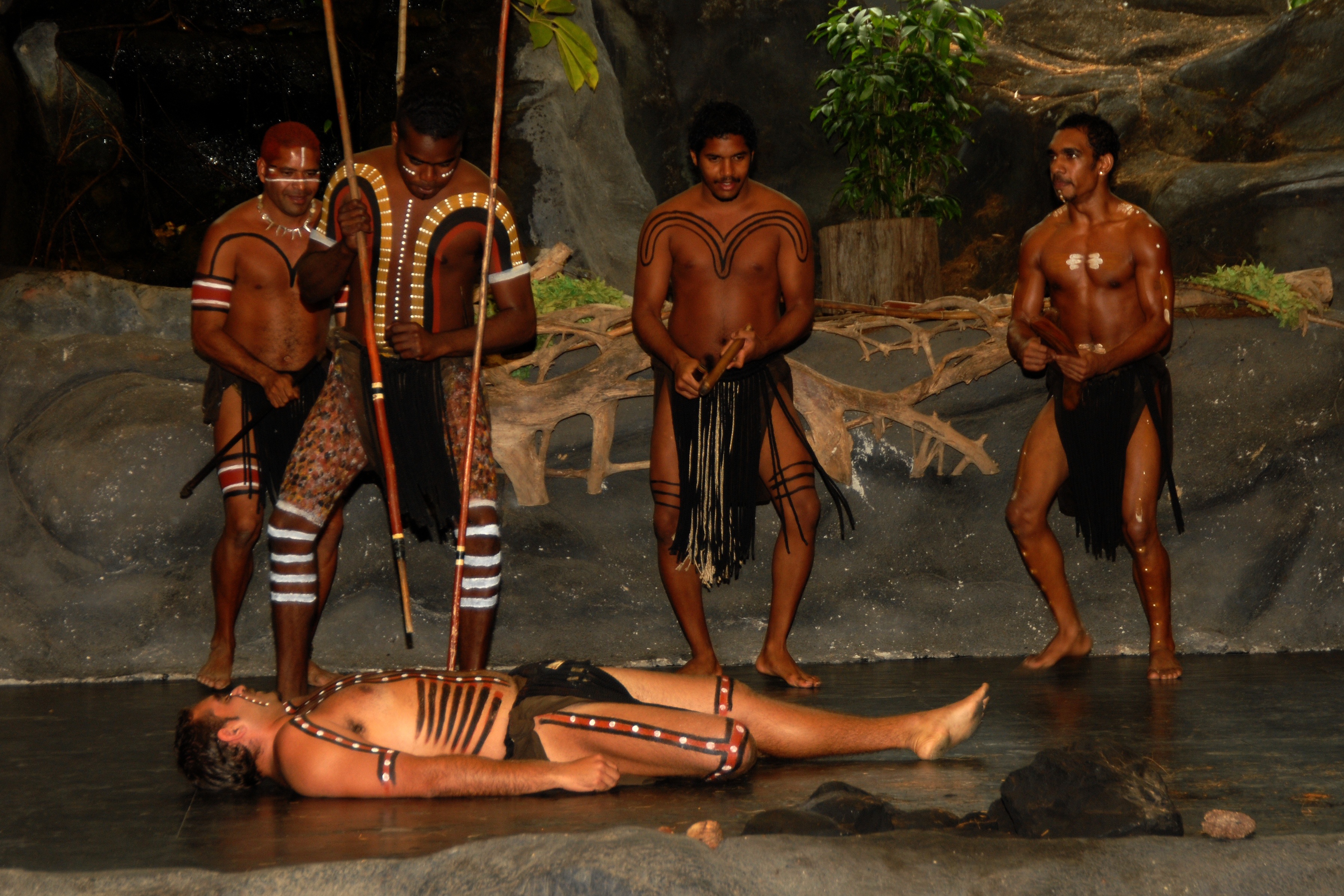 floor, standing, outdoors, 2K, lying, adult, clothing, holding, full length, stick, water, men, four, lifestyles, women, s, aborigines, day, beside, native american, HD Wallpaper