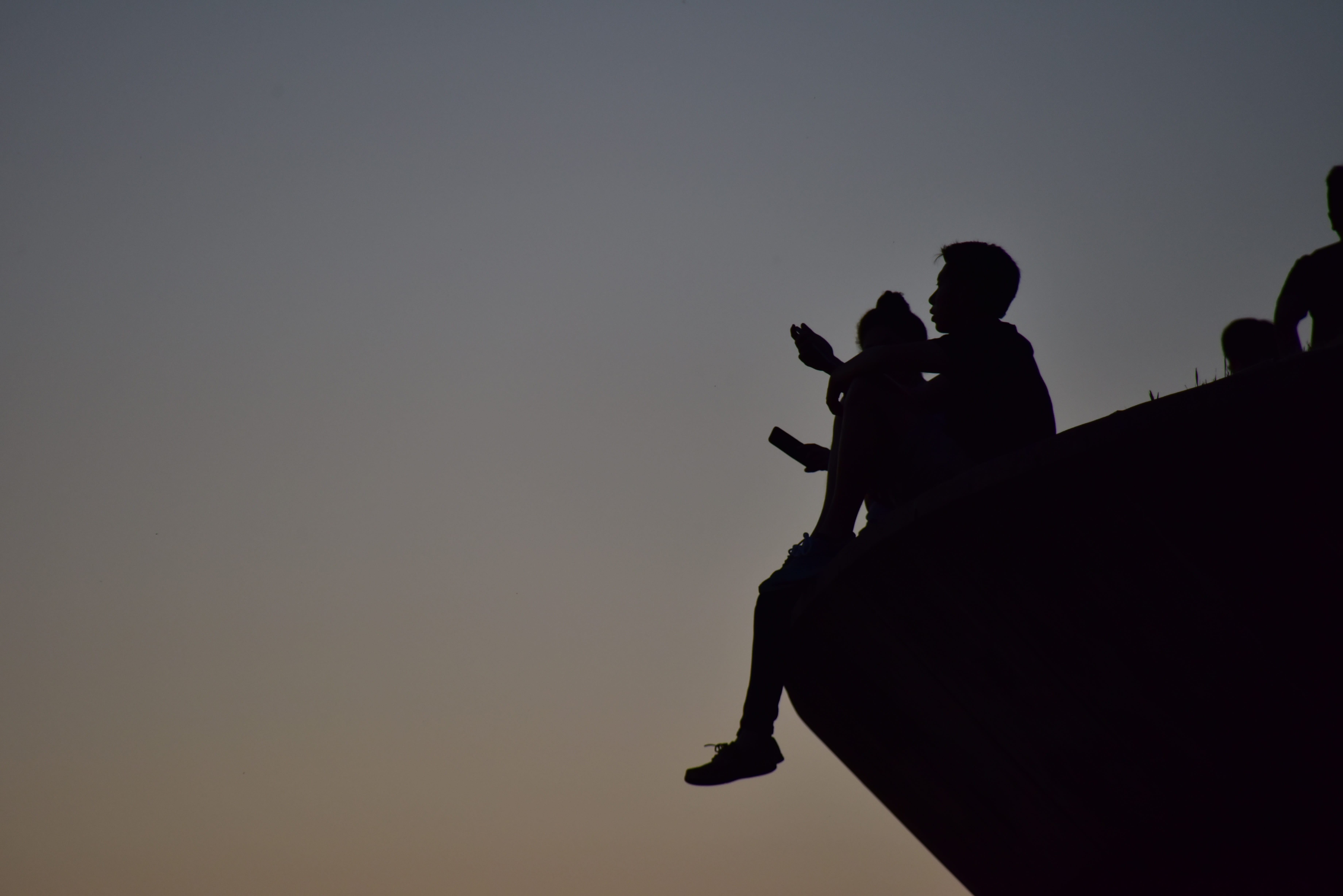 dusk, people, silhouette, solid, sitting, cornell, edge, 5K, men, portrait, american university study life, sky, low angle view, copy space, clear sky, HD Wallpaper