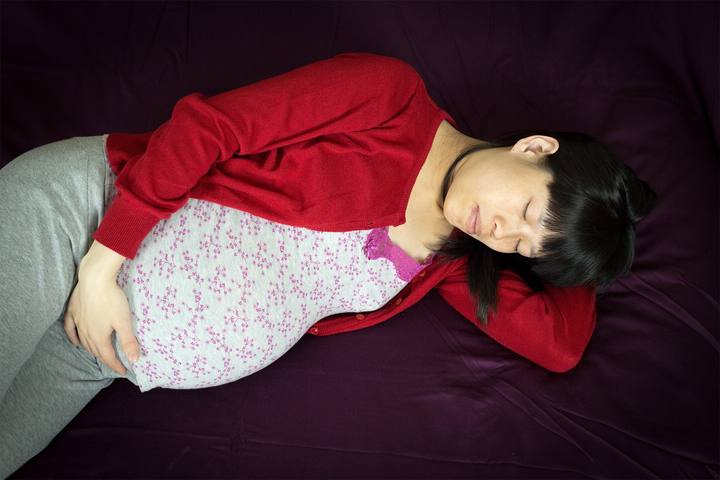 wearing, real people, love, lifestyles, zip, home interior, pregnancy, girl, young, eyes closed, adult, napping, pregnant woman, resting, red, female, high angle view, HD Wallpaper