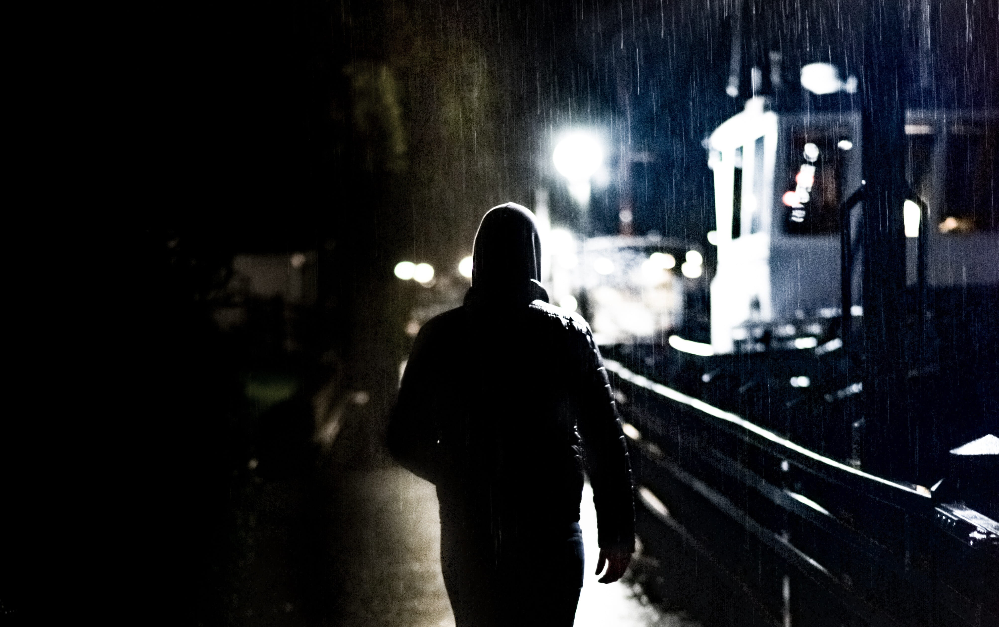 city life, vehicle, adult, dark, built structure, rear view, man, rain, one person, real people, silhouette, architecture, building exterior, people, illuminated, HD Wallpaper