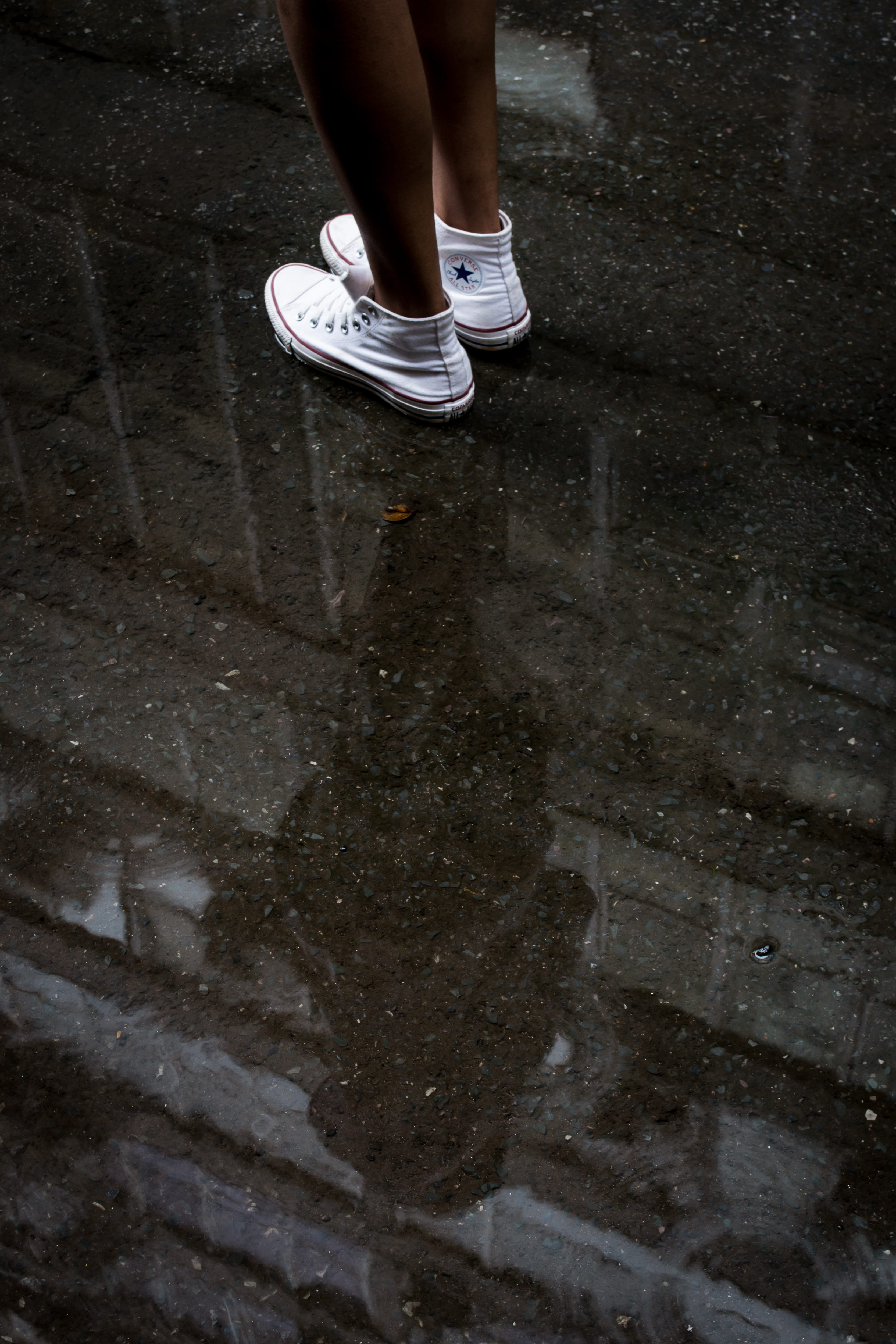 human limb, shoe, body part, puddle, converse, street, human leg, low section, real people, wet, sneakers, high angle view, wearing, feet, pair, shallow, Phone HD Wallpaper