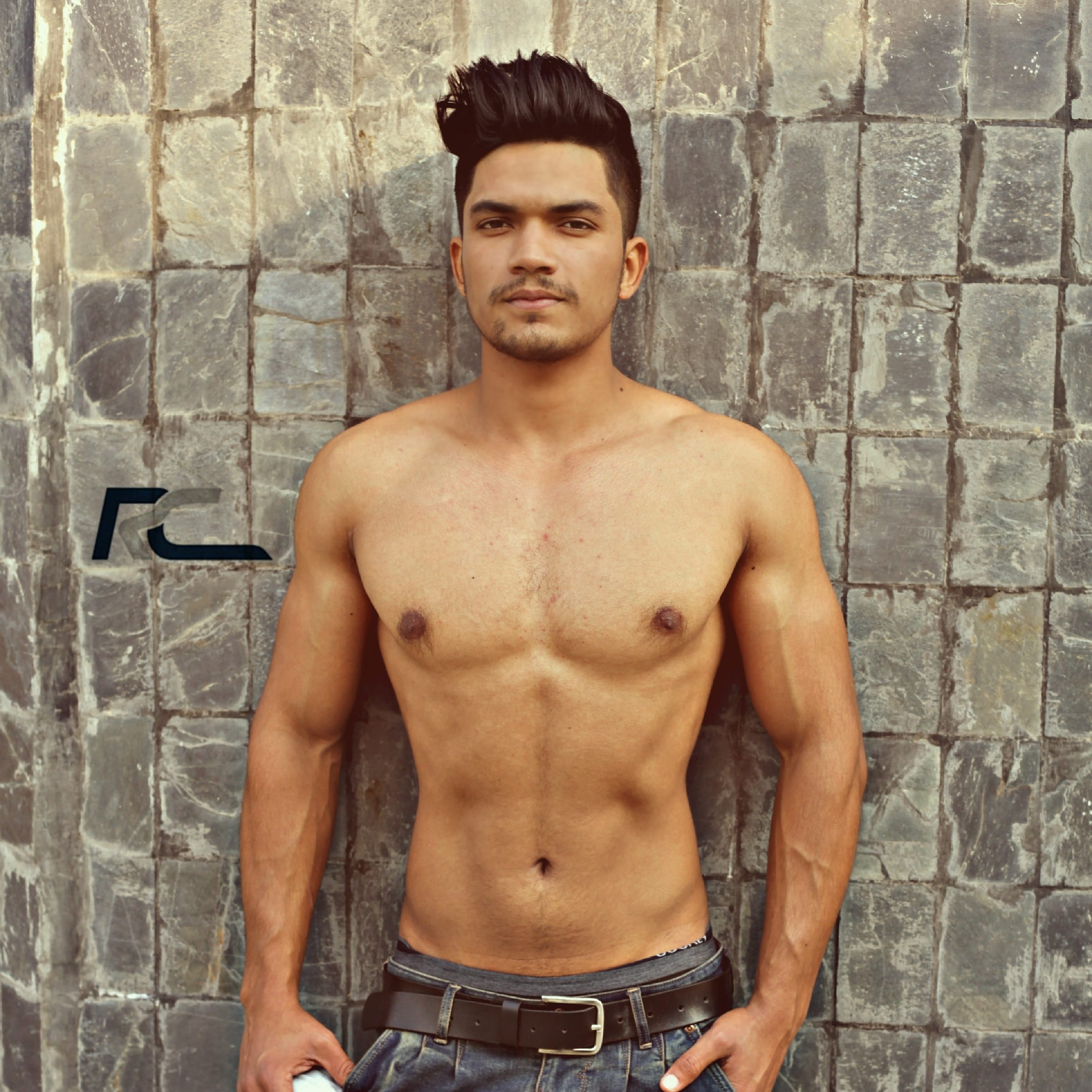 1080P, man, front view, wall, athlete, young adult, strength, brick, real people, adult, confidence, muscular build, shirtless, men, looking at camera, Phone HD Wallpaper