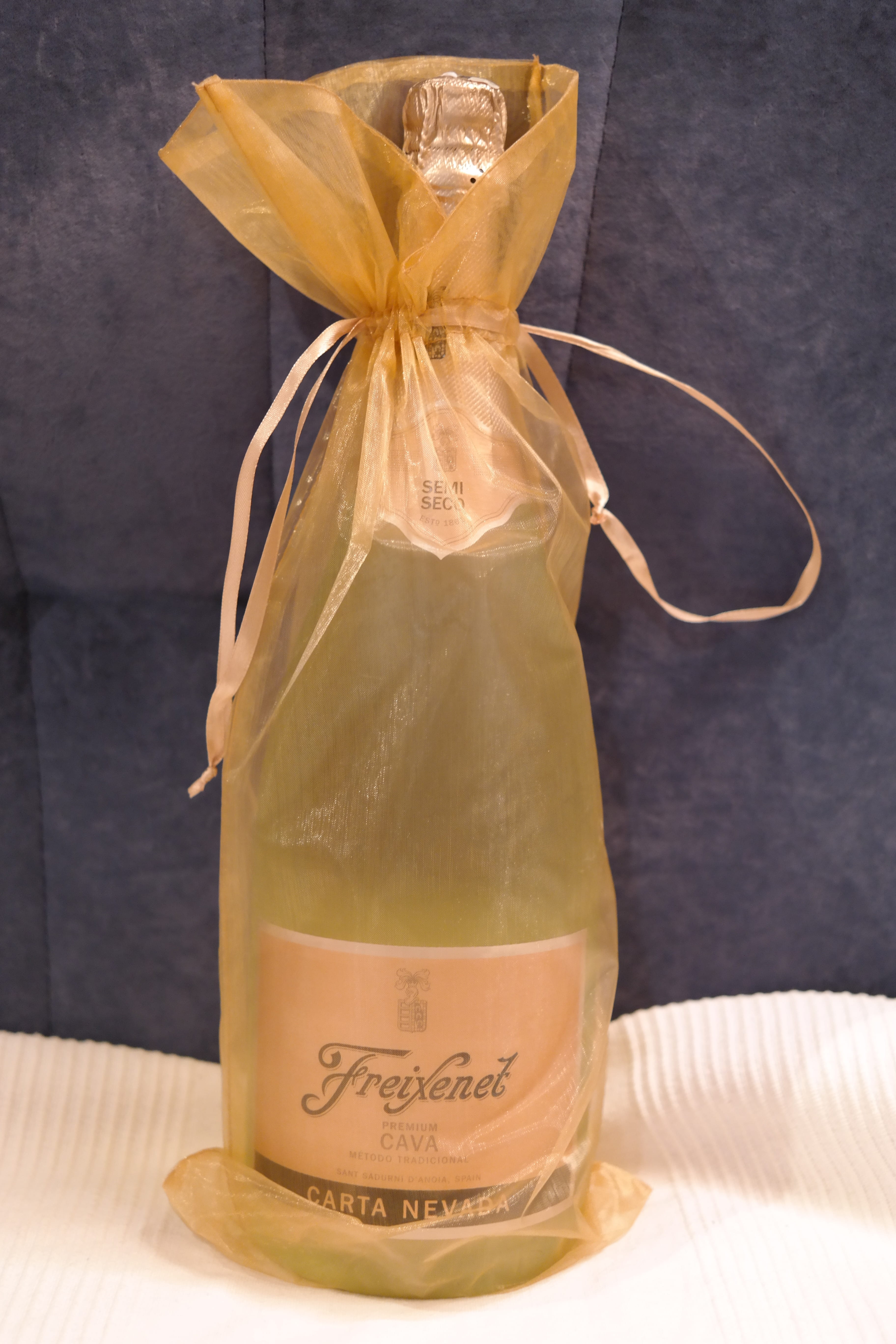 brown, bottle, no people, text, new year champagne, alcohol, western script, drink, bottle of sparkling wine, pouch, tied up, unopened, jar, closed, freixenet, Phone HD Wallpaper