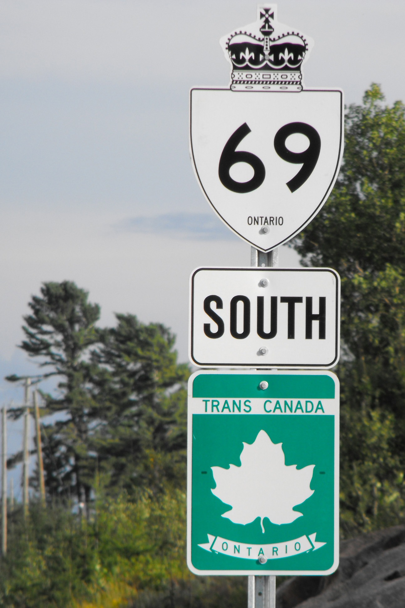 day, focus on foreground, ontario, direction, no people, landmark, plant, representation, road, text, highway, directional sign, road Sign, guidance, sky, Phone HD Wallpaper