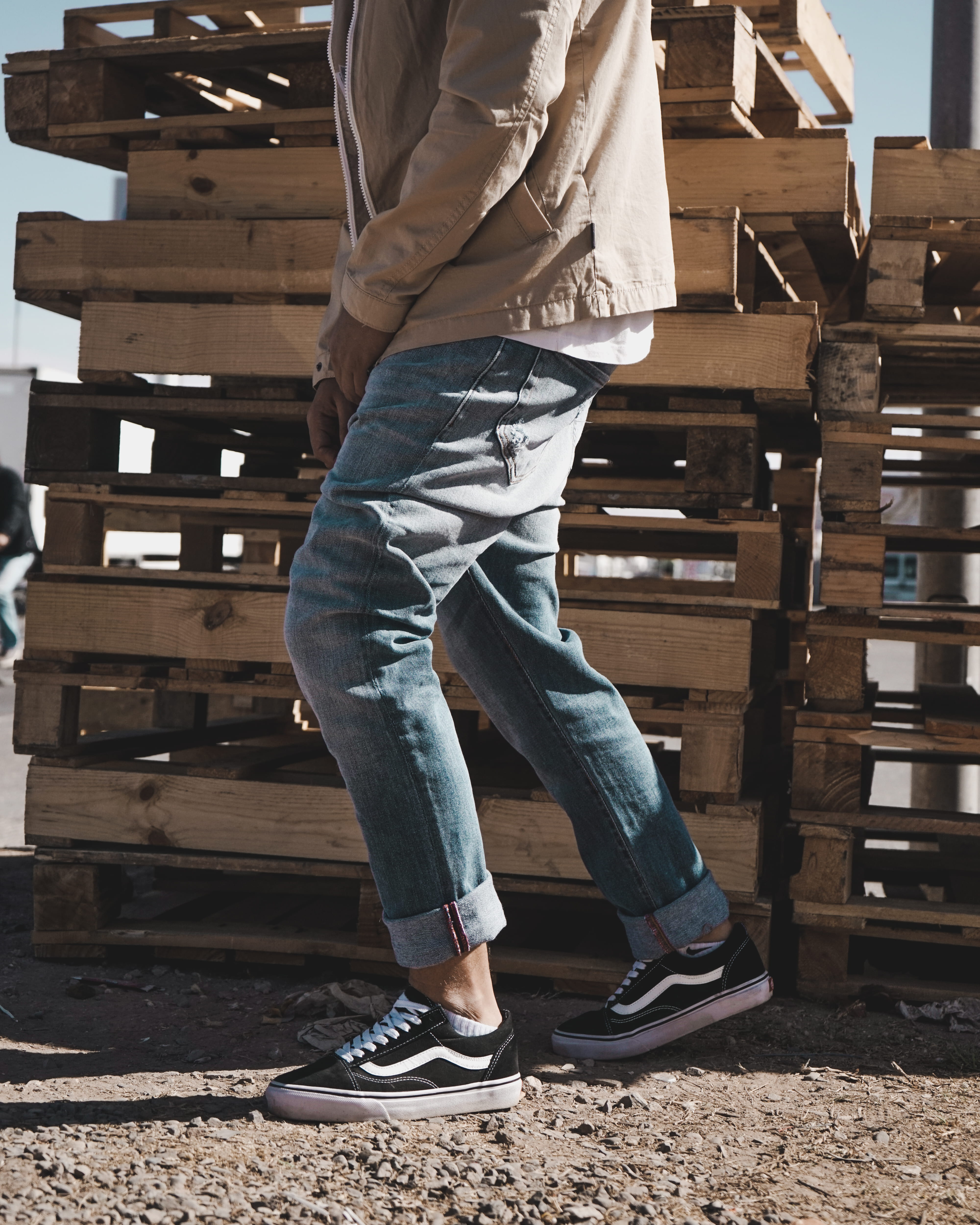 pallet, low section, man, beside, standing, bench, shoes, real people, human leg, outdoors, person, blue, casual clothing, jeans, male, wearing, day, lifestyles, Phone HD Wallpaper