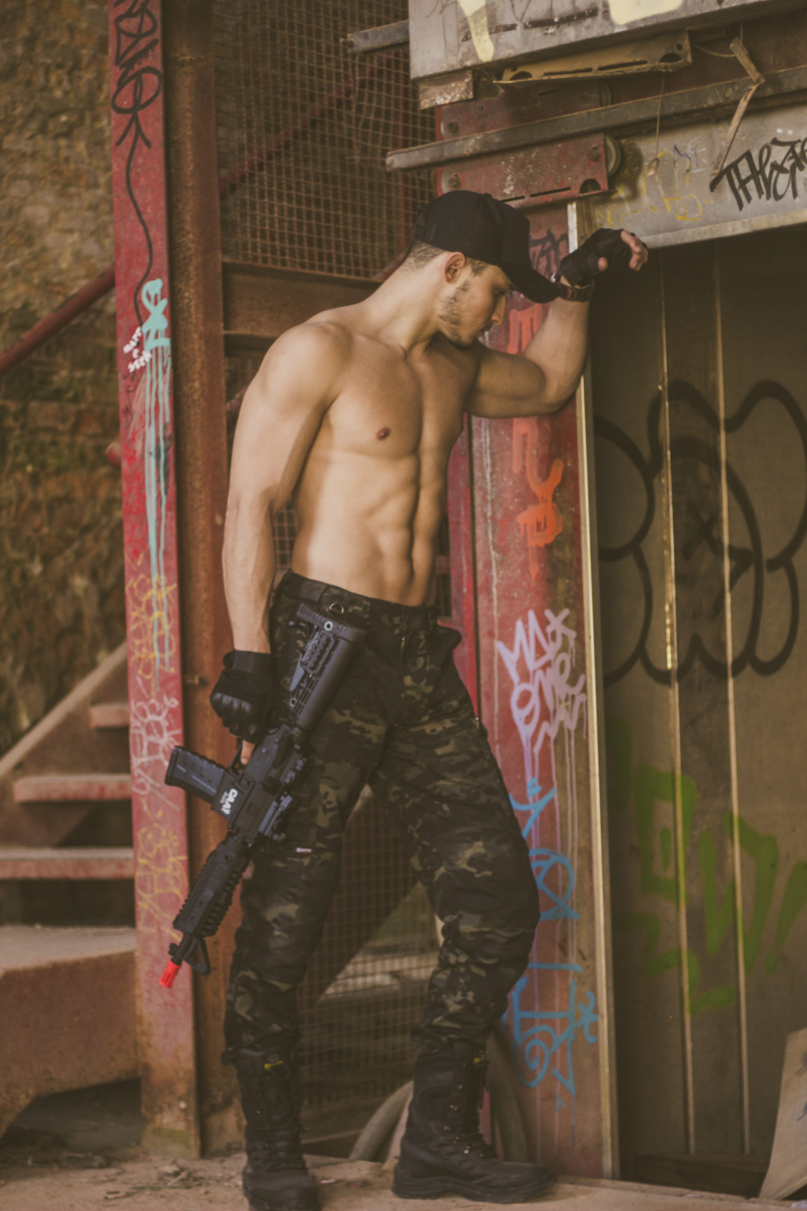 standing, weapon, real people, man, indoors, camouflage, wearing, three quarter length, muscular build, wear, architecture, chest, 4K, strength, muscles, Phone HD Wallpaper