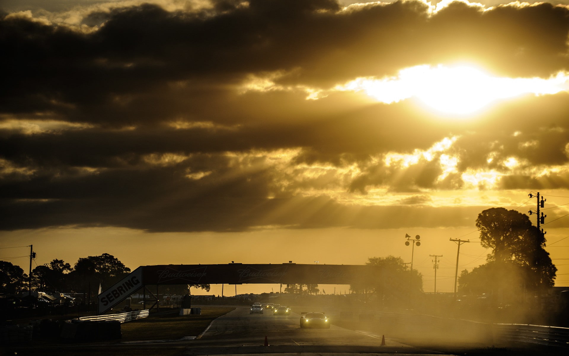 Nascar, sunset, sun rays, 1080P, race cars, dappled sunlight, race tracks, HD Wallpaper
