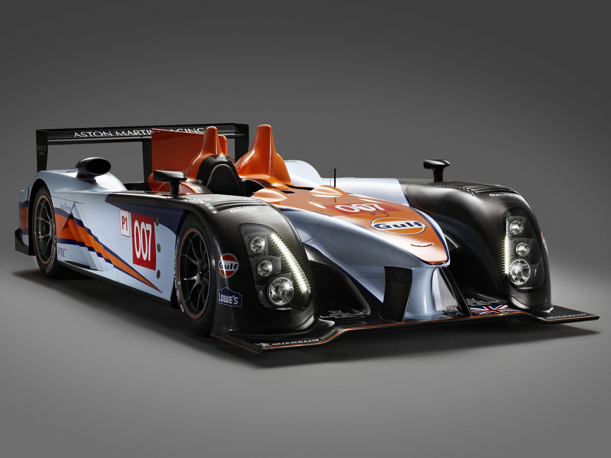 motor Racing Track, indoors, winning, 2011, studio shot, success, competition, driver, racing car, drive, orange, 1080P, amr-one, wheel, engine, motorsport, HD Wallpaper