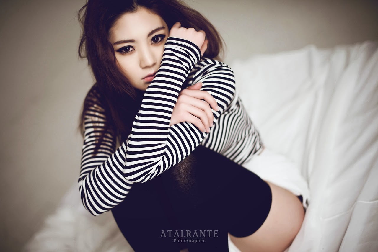 lifestyles, Asian, real people, dark eyes, leisure activity, indoors, beauty, striped, casual clothing, sadness, young adult, front view, brunette, beautiful woman, HD Wallpaper