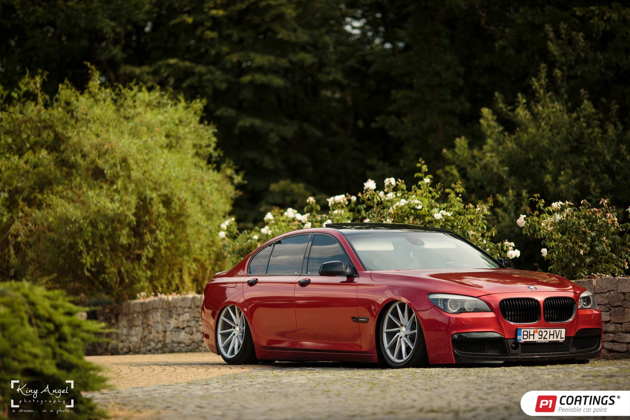 land vehicle, BMW 7 Series, plant, nature, focus on foreground, mode of transportation, red, sunlight, day, GajuKYD, outdoors, Vossen CVT, no people, green color, HD Wallpaper