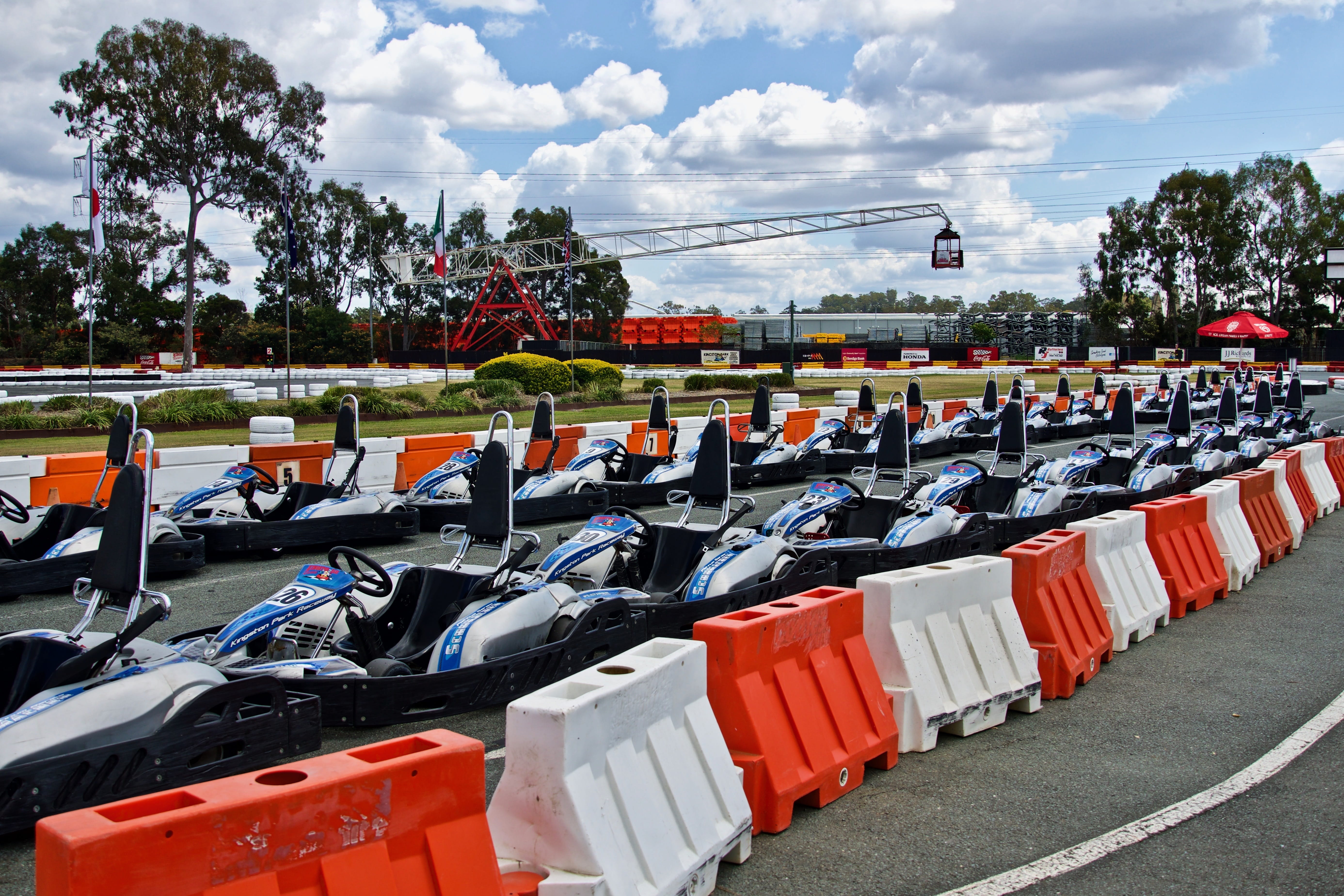 gocarts, speed, racer, in a row, 5K, arrangement, mode of transportation, vehicle, karting, empty, sports race, large group of objects, plant, carting, HD Wallpaper