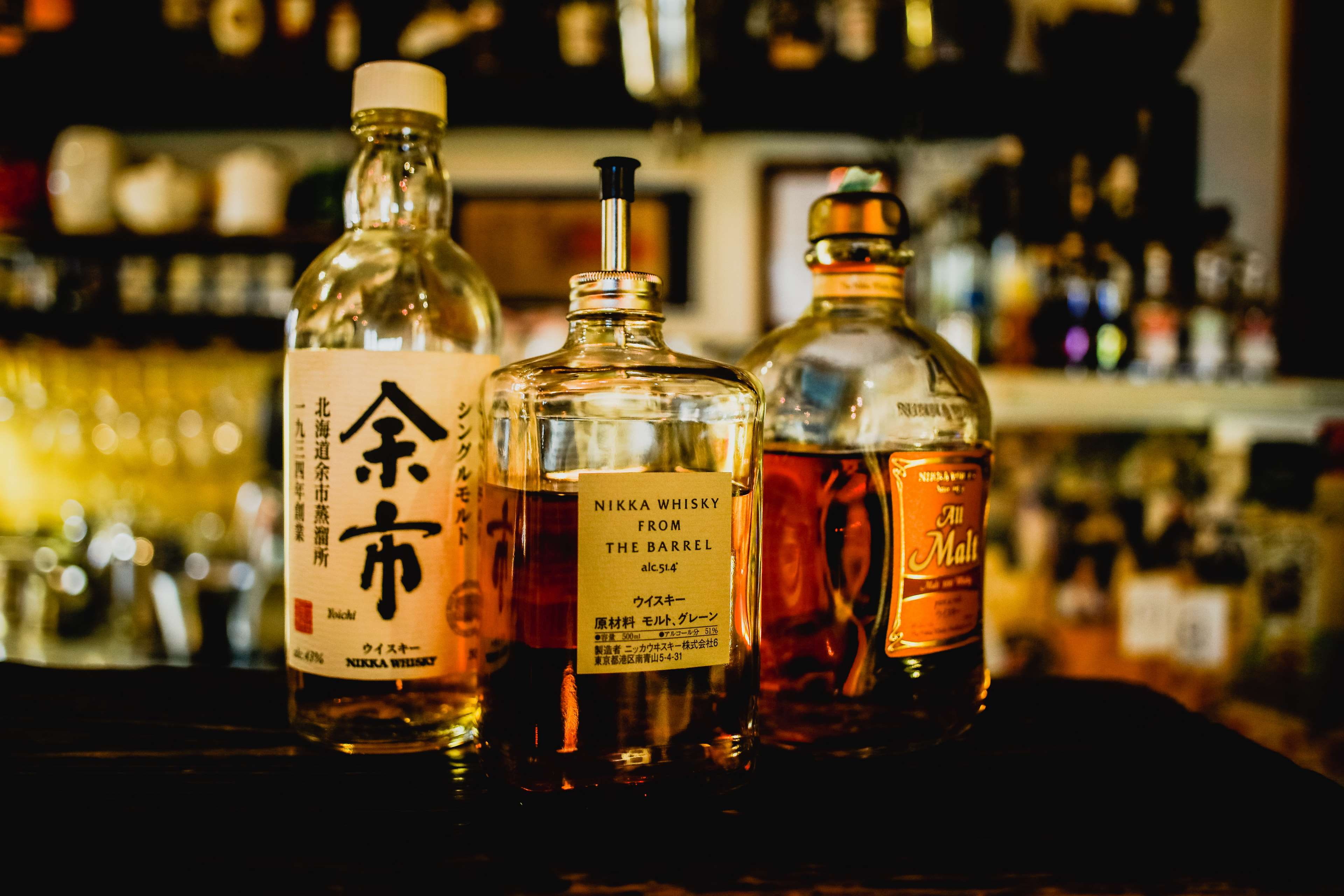 liquor, herbal medicine, bottle, shelf, wine, indoors, blur, party, bar, food and drink, nightlife, liquid, glass - material, alcohol bottles, close up, HD Wallpaper