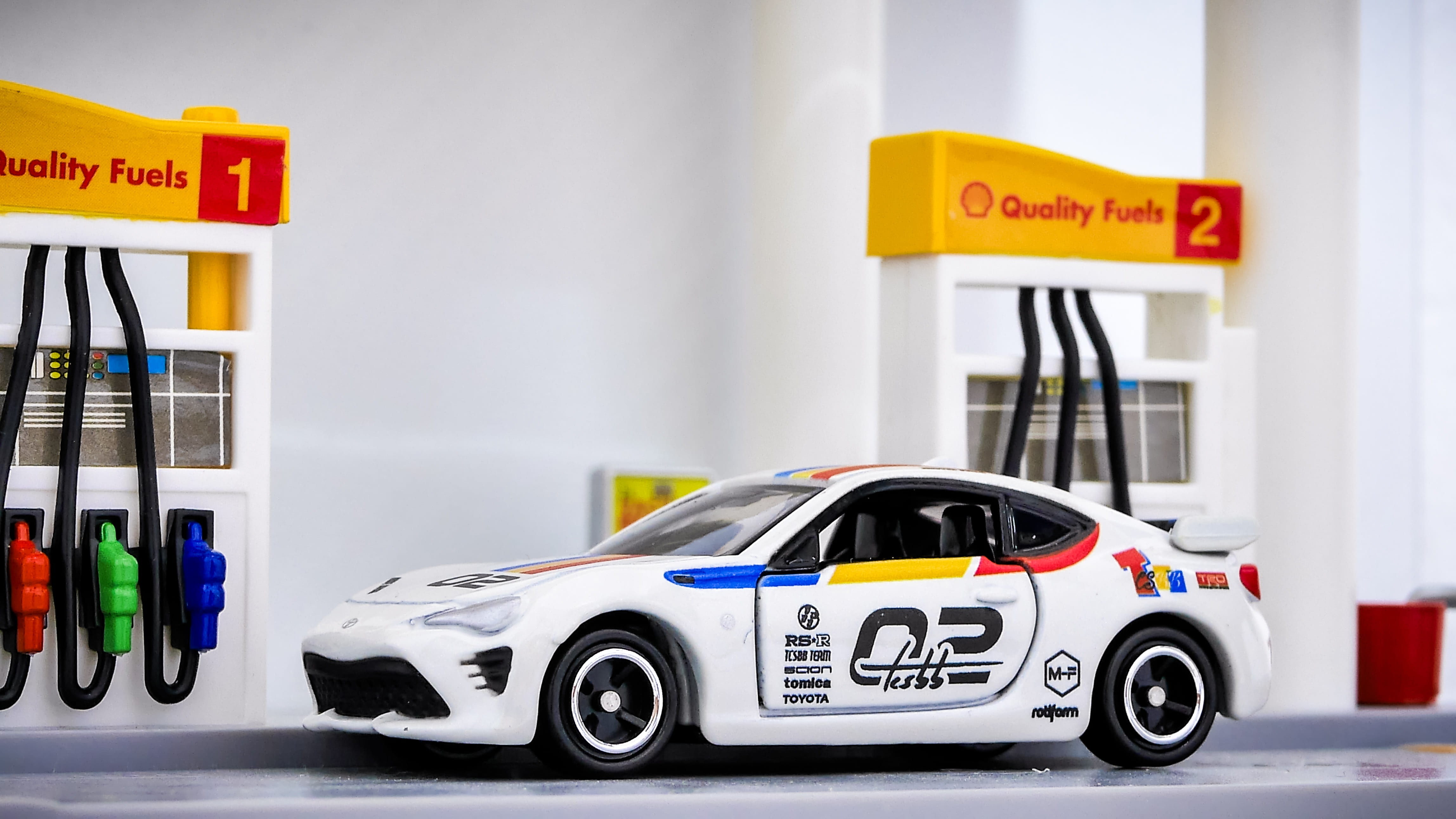 text, car, communication, no people, tomica, western script, tomy, transportation, fuel and power generation, sign, tcsbb, travel, arrival, toyota, refueling, HD Wallpaper