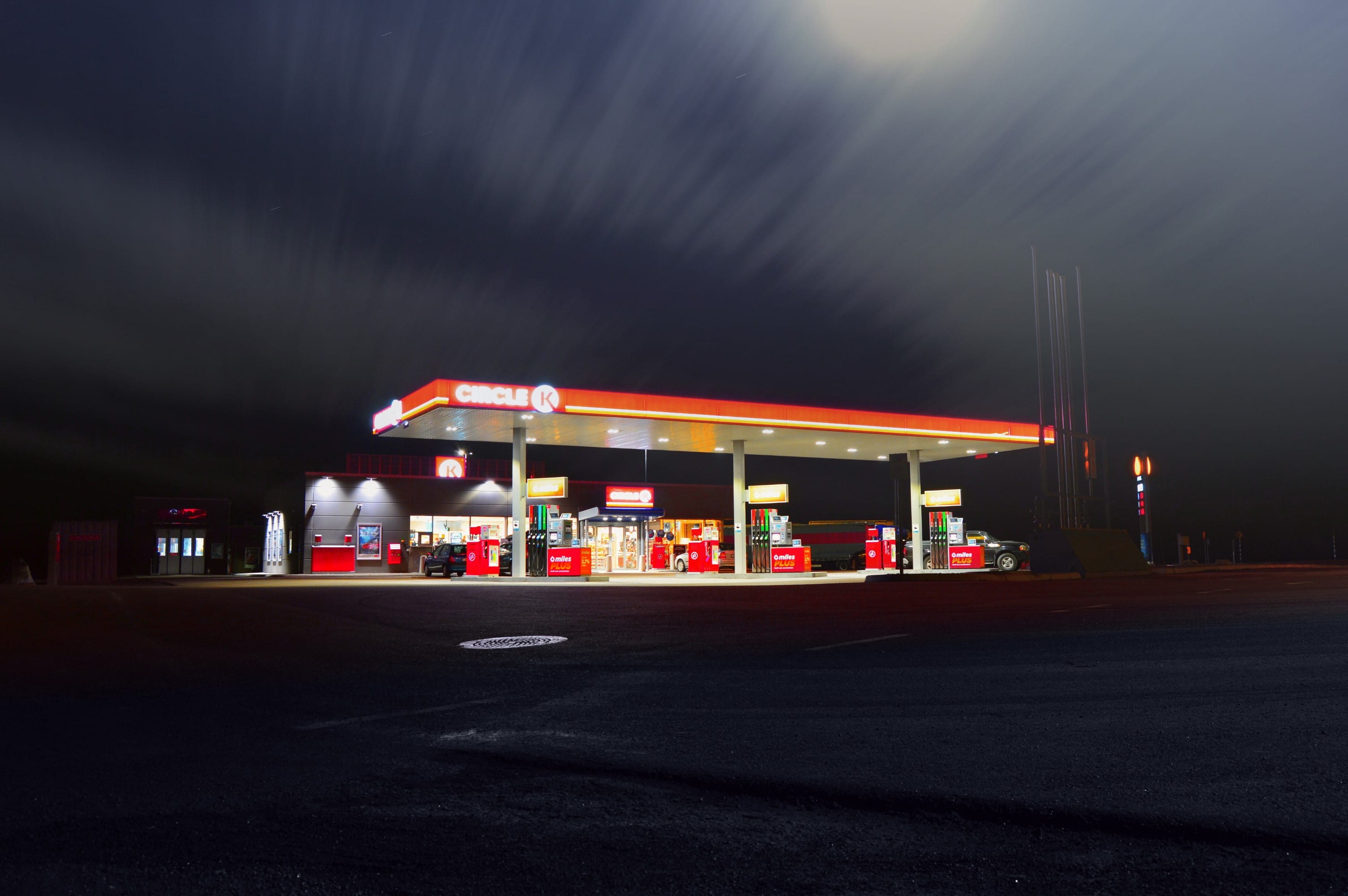 outdoors, sweden, lit, street, city, pumps, no people, fuel pump, illuminated, store, blurred, oil industry, outside, station, building exterior, circle, HD Wallpaper
