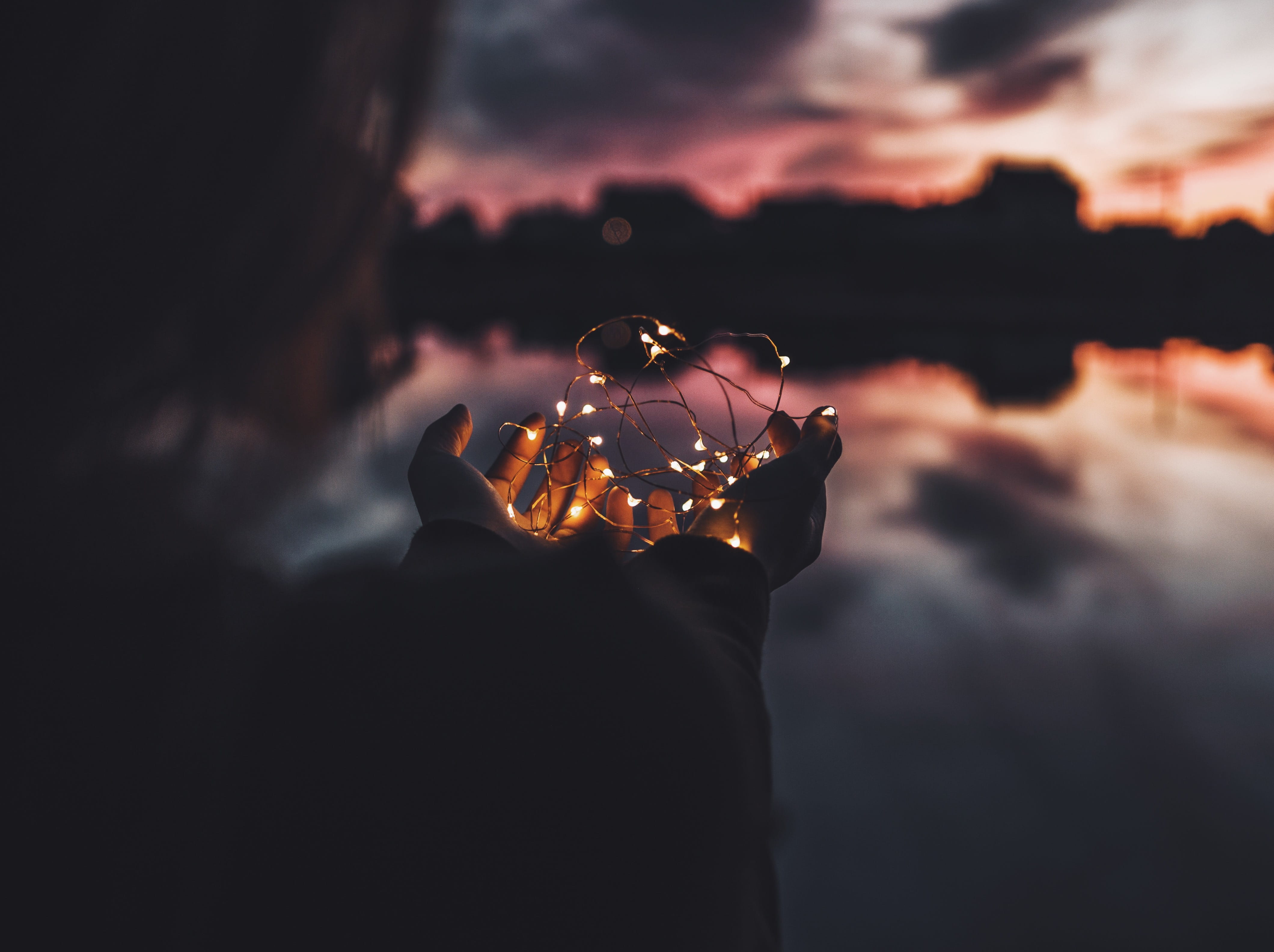 people, nighttime, turned, sky, light, nature, burning, lifestyles, real people, men, hand, finger, yellow, lights, human hand, leisure activity, focus on foreground, HD Wallpaper
