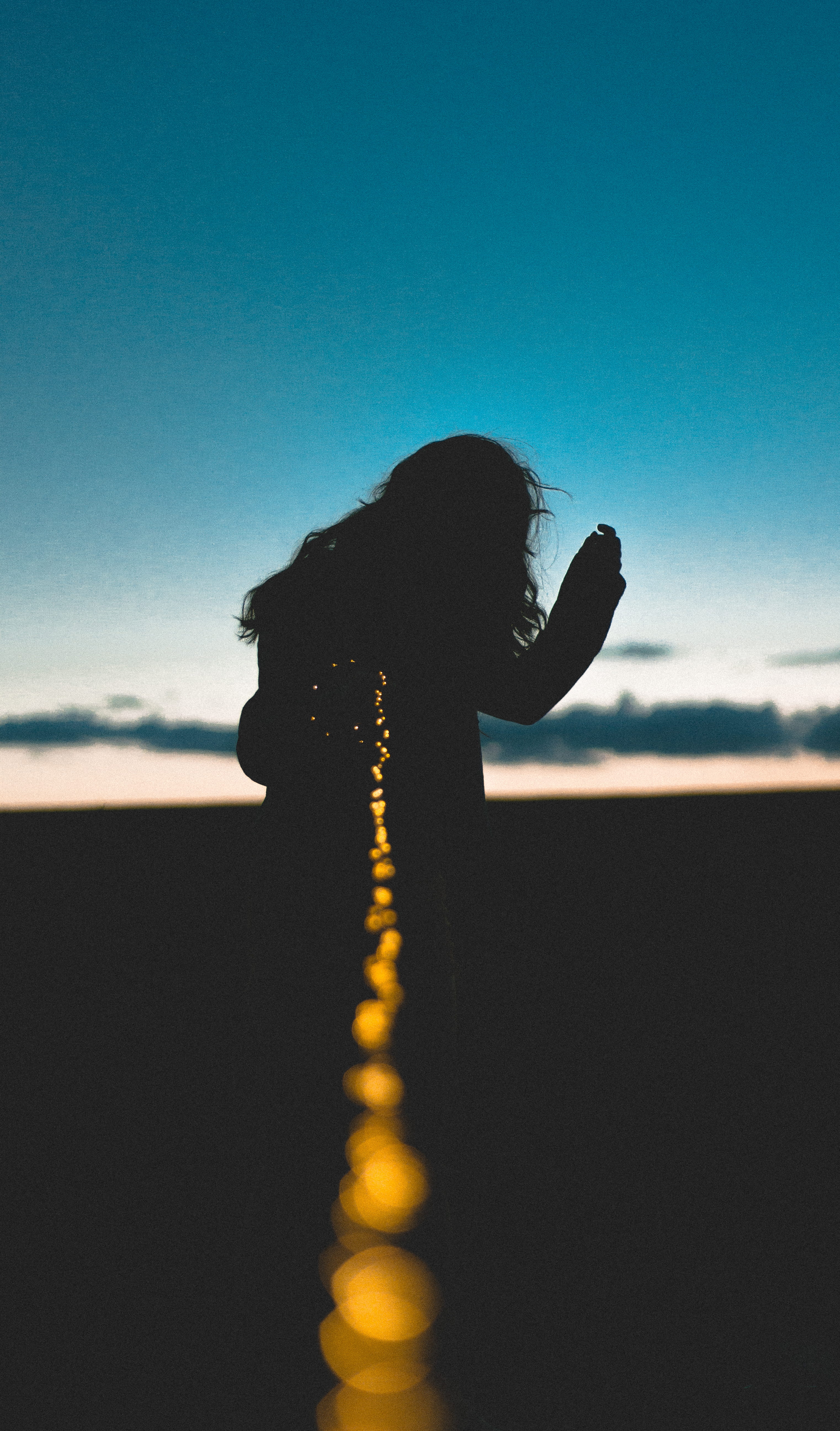 lights, dusk, one woman only, silhouette, woman, outdoors, back Lit, sky, fairy light, people, nature, sunlight, turned, person, women, real people, summer, Phone HD Wallpaper