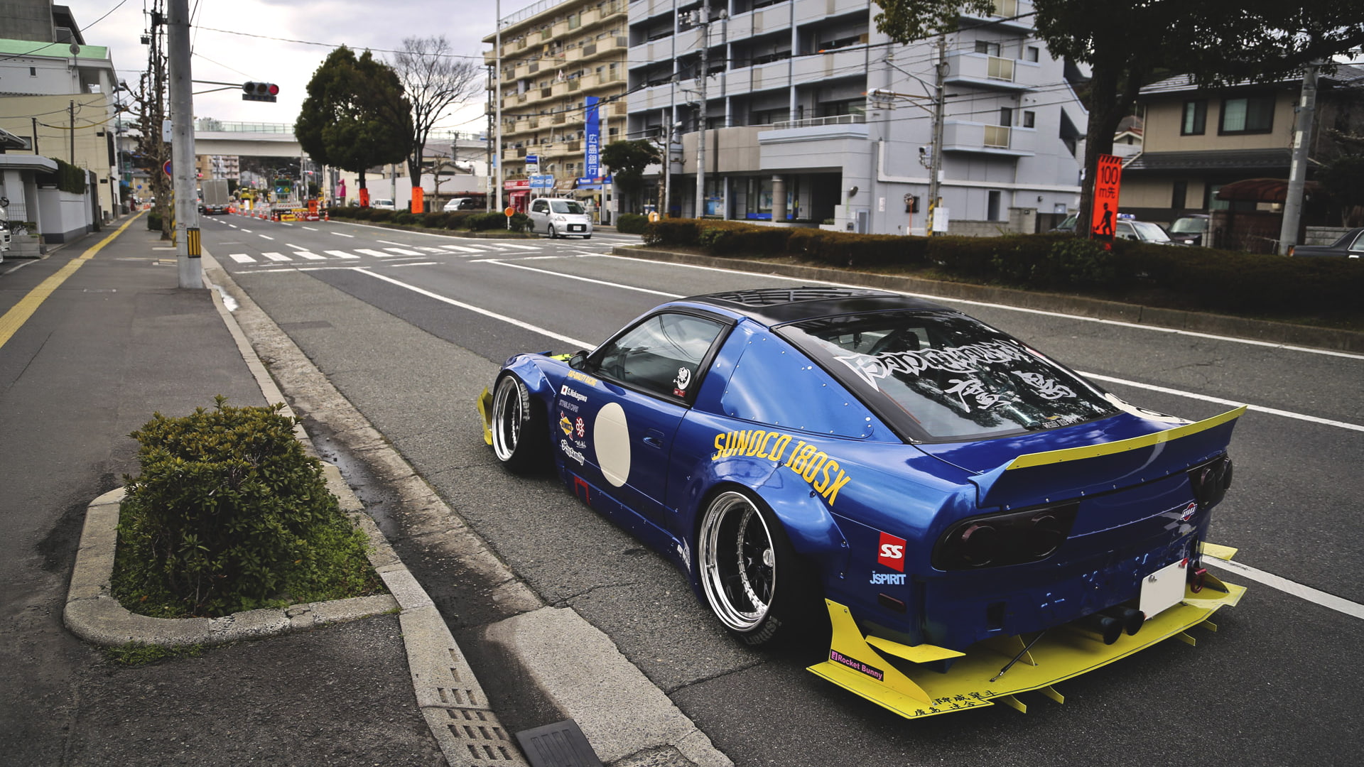 architecture, car, plant, motor vehicle, 180sx, transportation, building, Nissan, yellow, city street, road marking, day, city, building exterior, road, HD Wallpaper