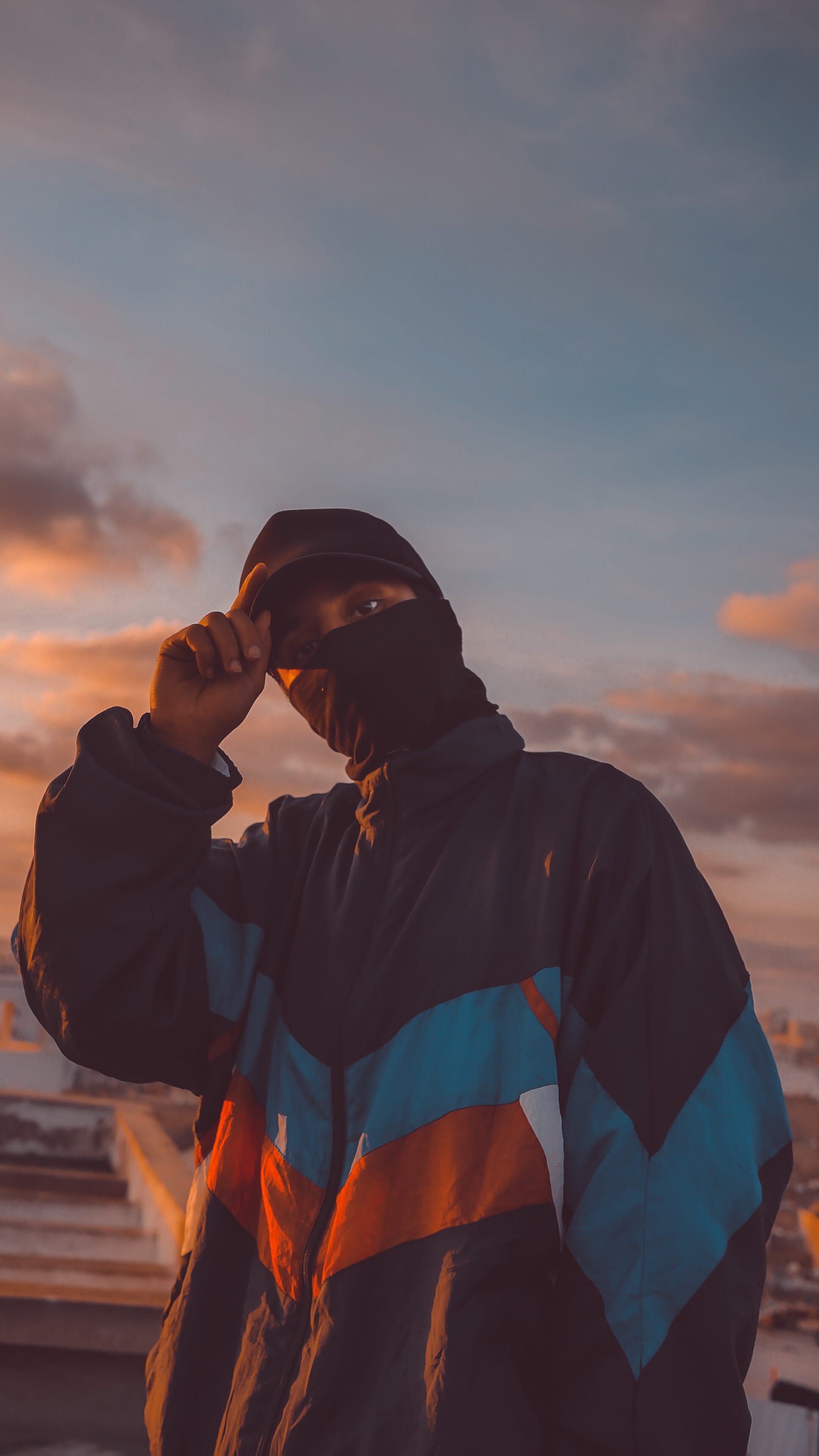 cloud - sky, clothing, beauty in nature, mature men, hood - clothing, building, sweater, fashion, parachute, 4K, orange color, males, ninja, tower, apparel, Phone HD Wallpaper