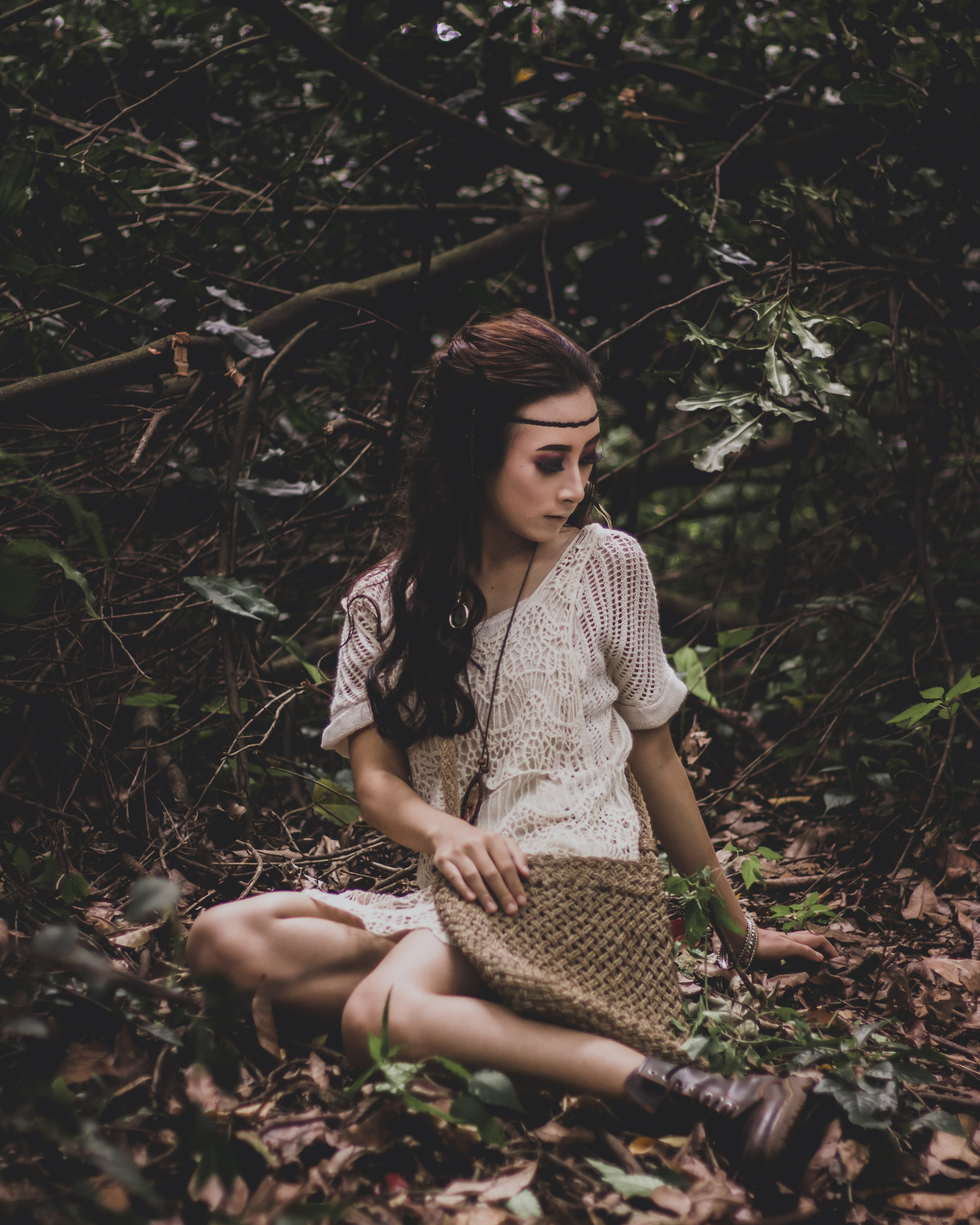 sitting, autumn, land, dried, forest, shirt, plant, gray, real people, caucasian, girl, bandung, surrounded, fresh, leaves, women, hairstyle, woman, day, Phone HD Wallpaper