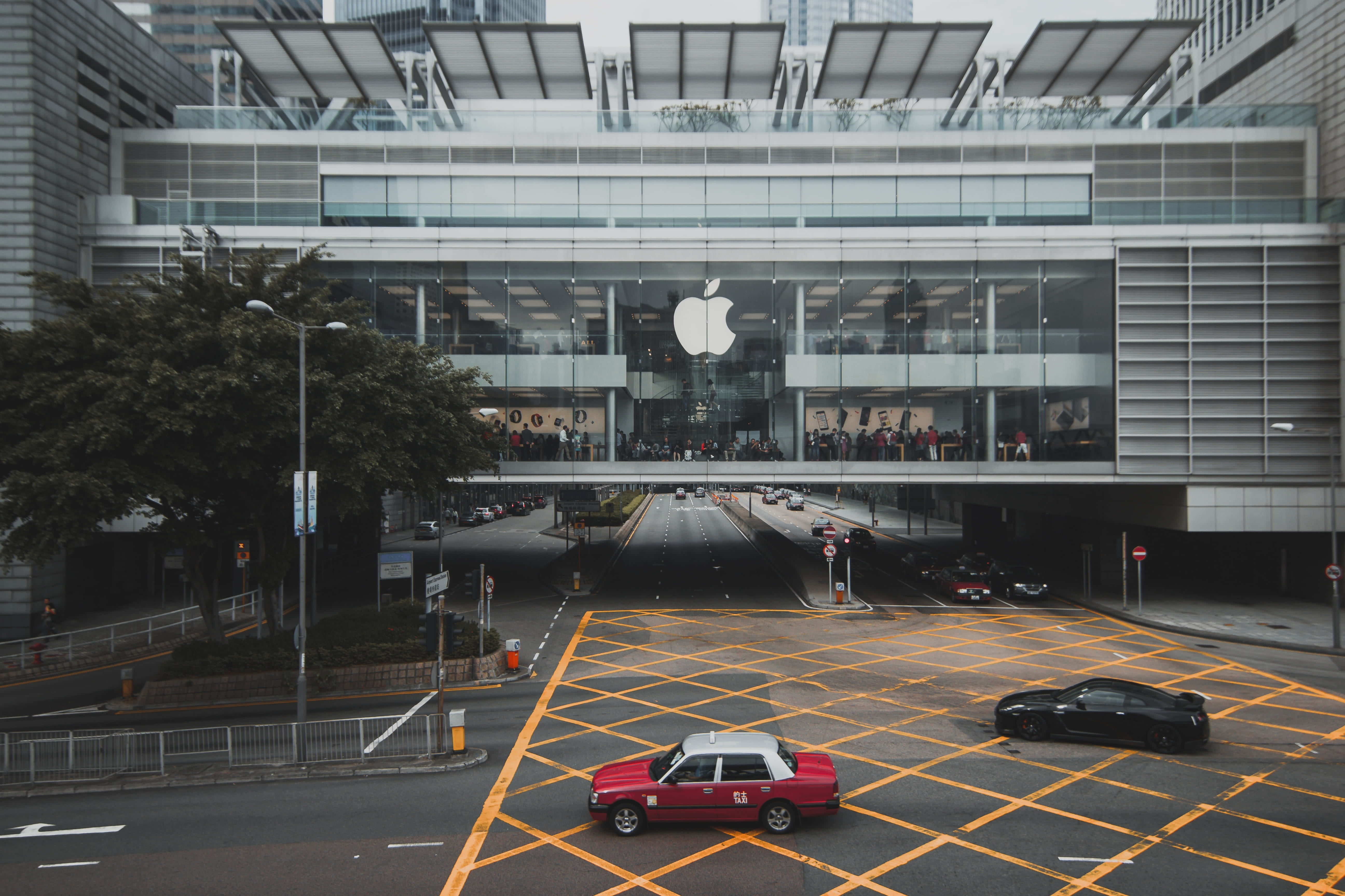 gt, glass - material, land vehicle, apple, parking, tree, city, building exterior, men, day, building, transportation, incidental people, red, near, mode of transportation, HD Wallpaper