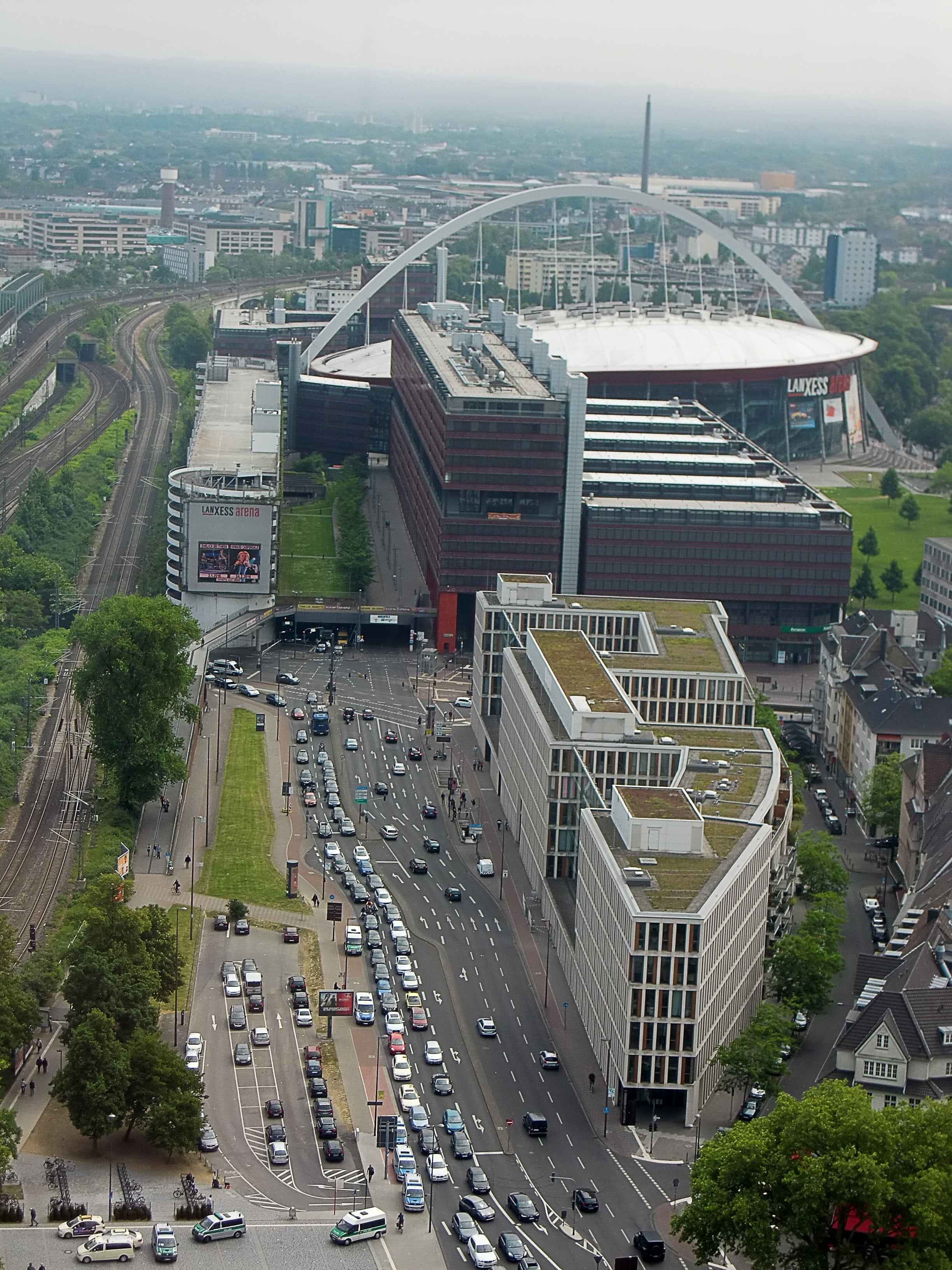 lanxess arena, car, cityscape, day, outdoors, no people, cologne, nature, built structure, jam, office building exterior, multiple lane highway, autos, Phone HD Wallpaper