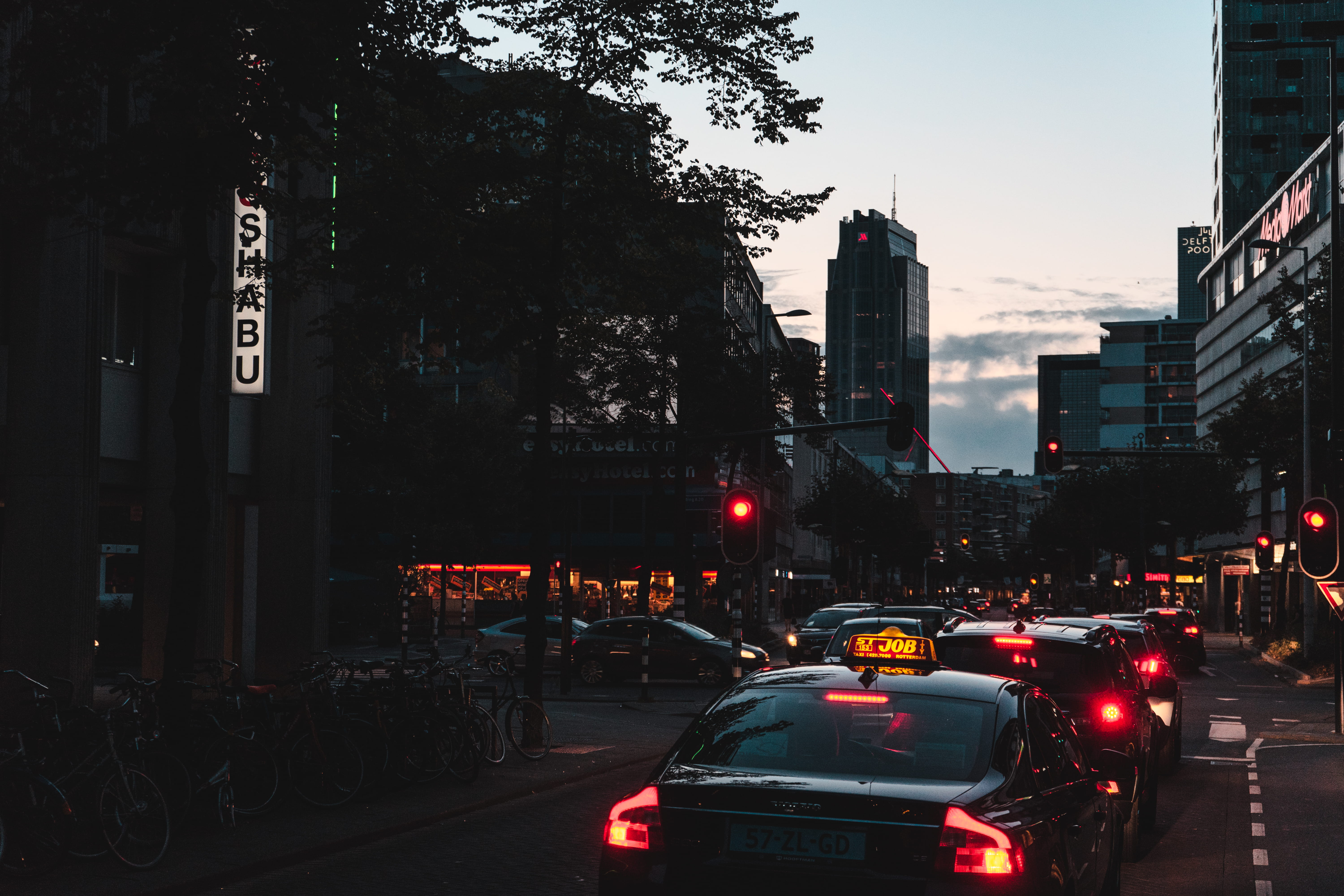 traffic jam, nature, skyscraper, city, tree, motor vehicle, cab, town, architecture, transportation, office building exterior, netherlands, road, sky, street, HD Wallpaper