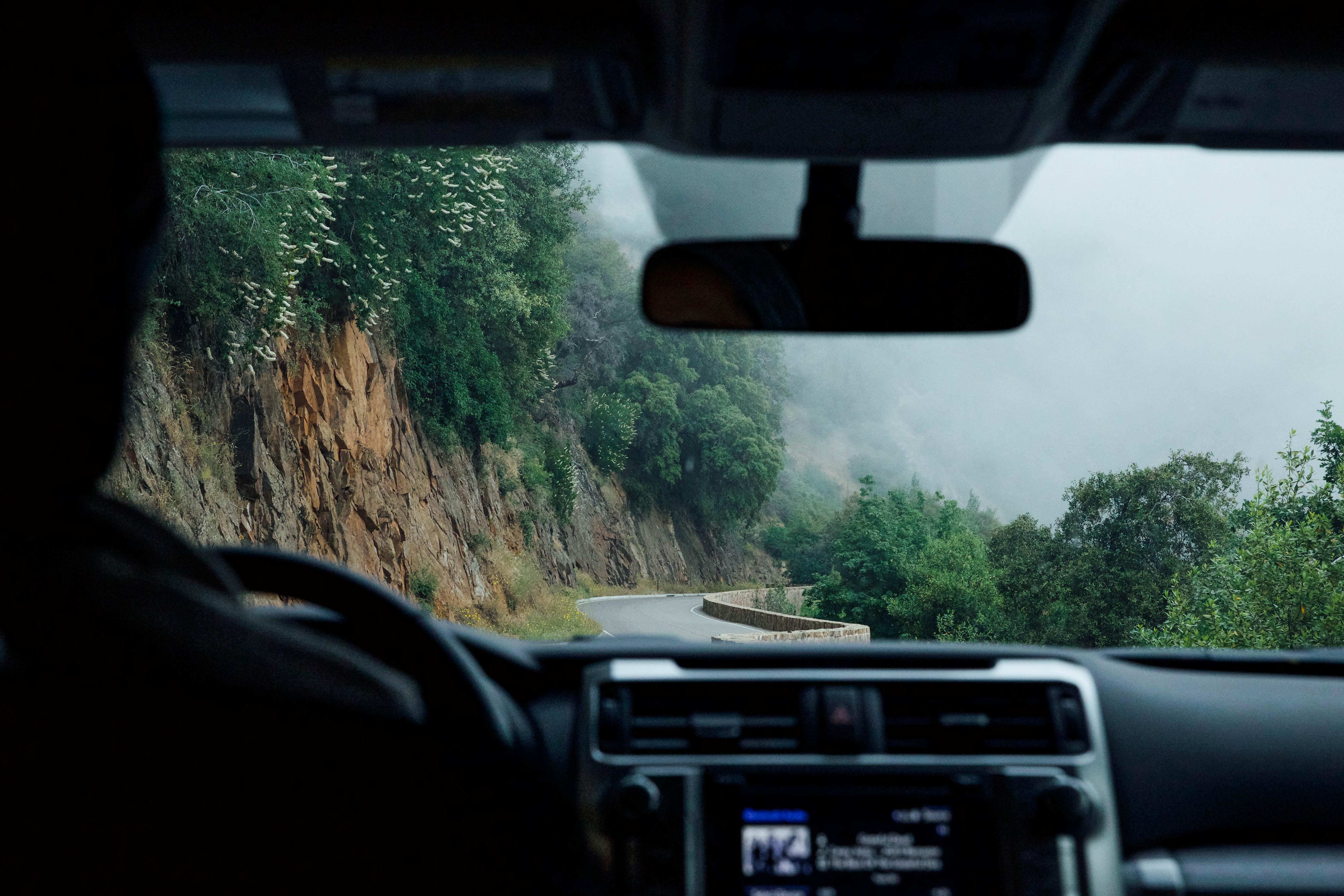 dashboard, land vehicle, control panel, cliff, windshield, daytime, plant, road, person, road trip, transportation, mode of transportation, 5K, glass - material, HD Wallpaper