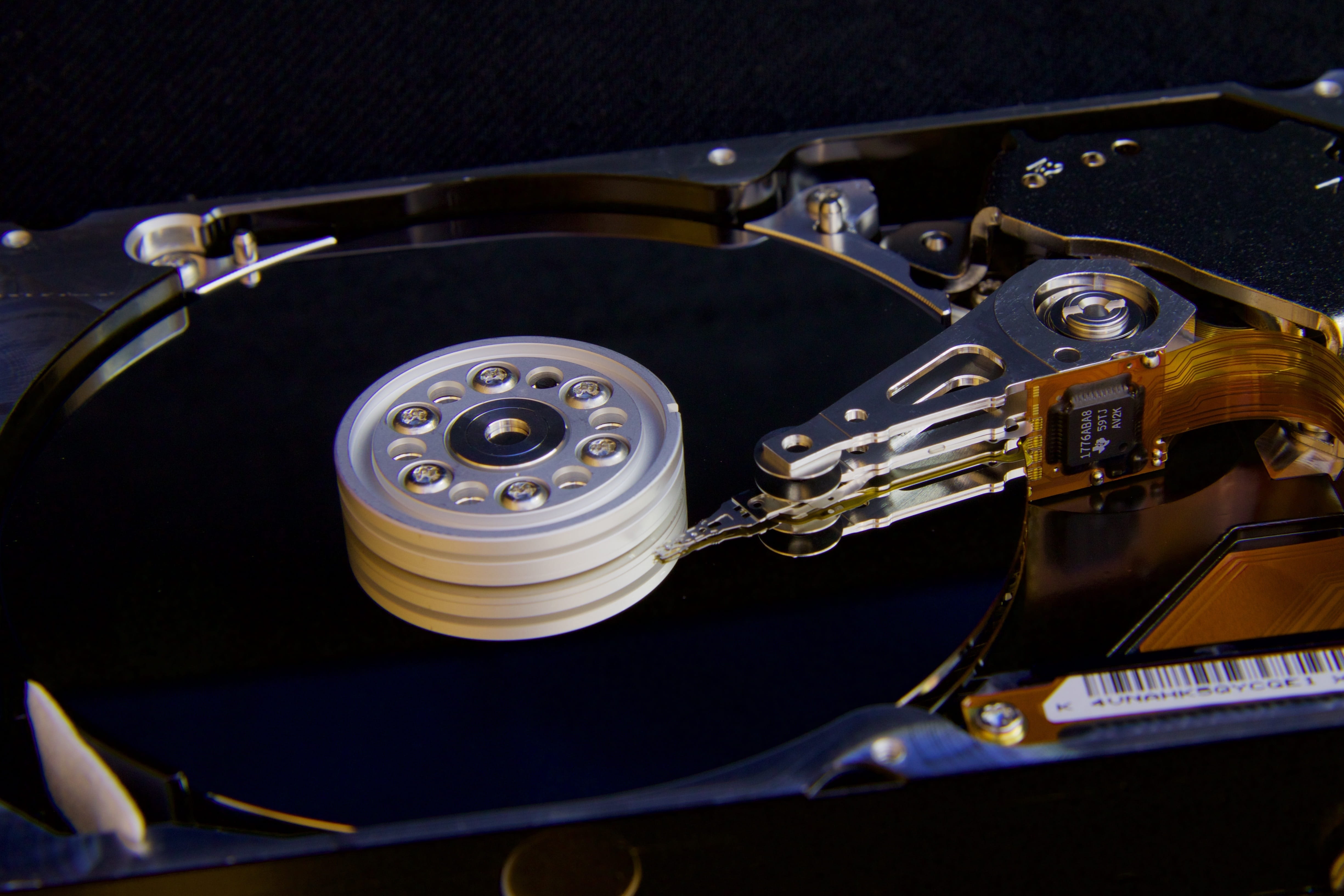 no people, still life, indoors, metal, Hard Drive, black background, Disc, connection, Arm, player, macro, computer, computer Part, high angle view, Reading, HD Wallpaper