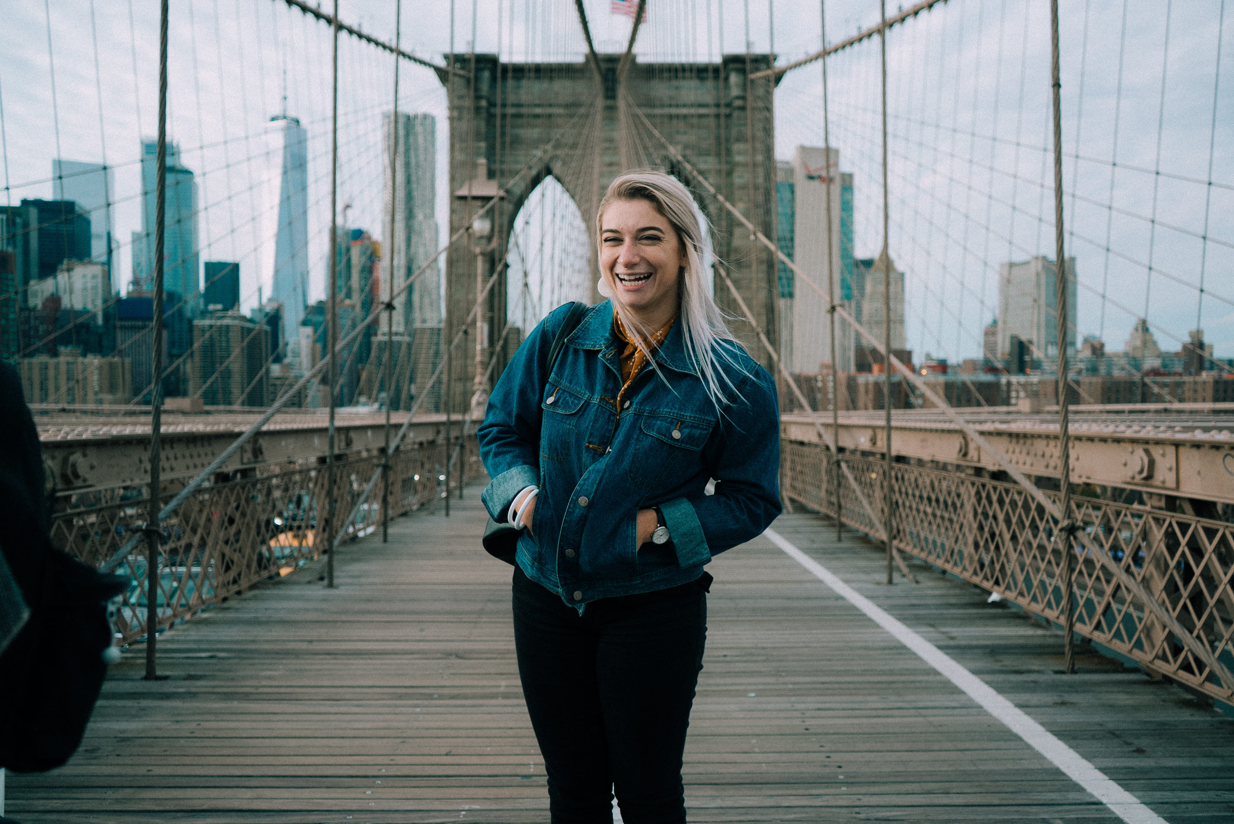 4K, lifestyles, front view, hairstyle, blue, city, bridge - man made structure, woman, footbridge, blonde hair, casual clothing, young adult, women, denim, HD Wallpaper