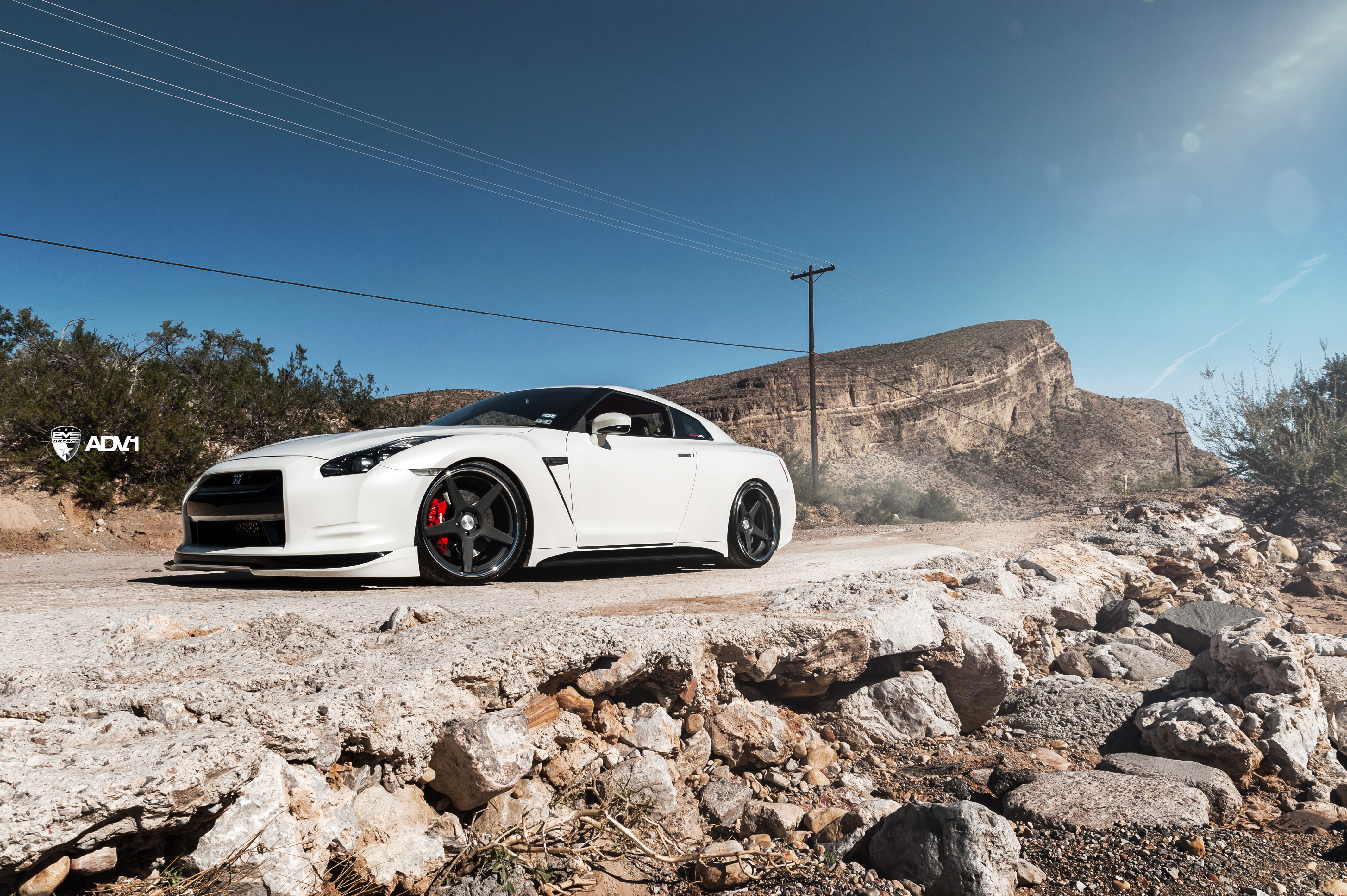 solid, cable, transportation, electricity, landscape, nissan, r, environment, coupe, road, 4K, sky, land, stationary, rock, sunlight, blue, motor vehicle, HD Wallpaper