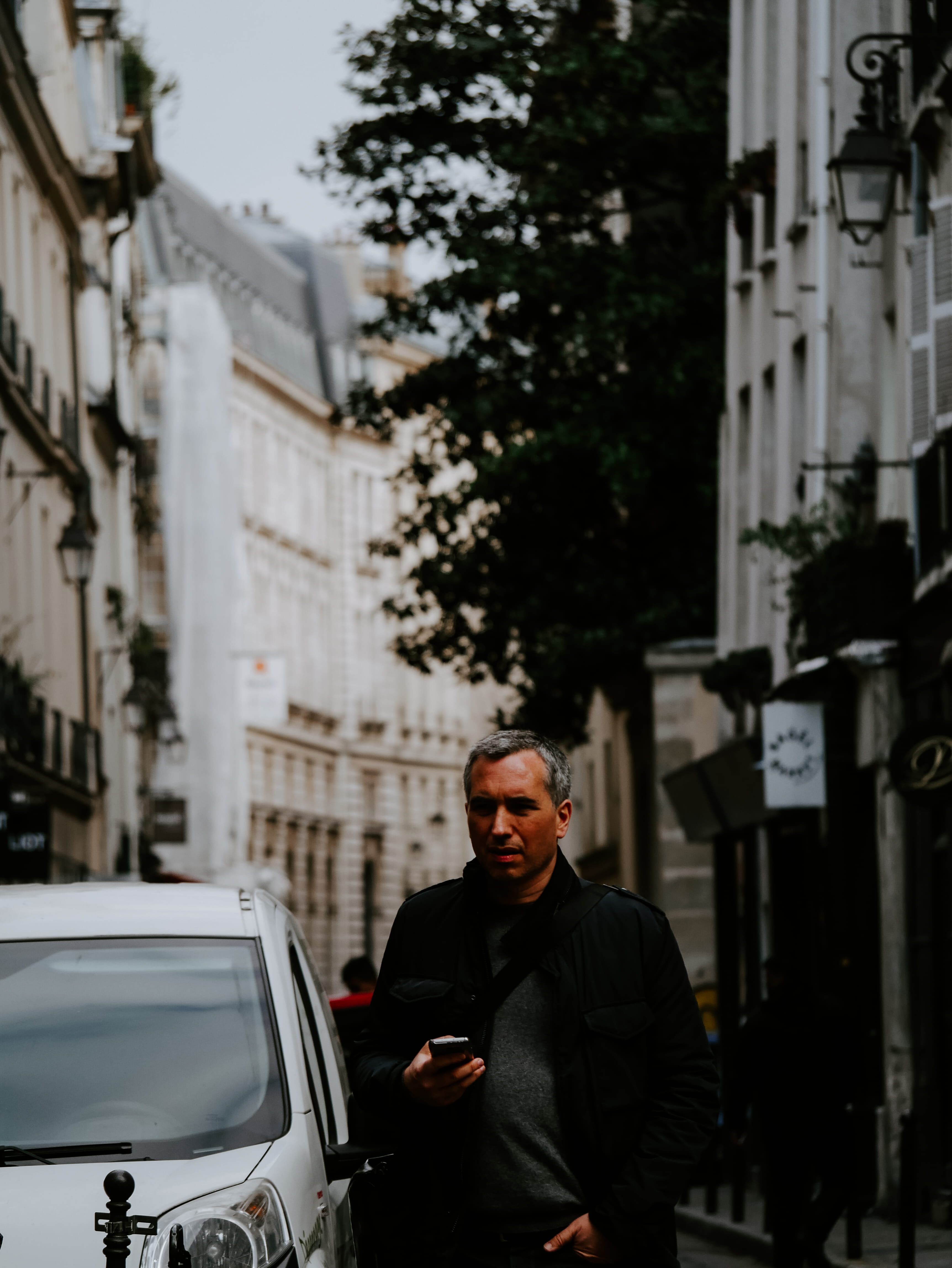 automobile, mode of transportation, real people, car, built structure, pedestrian, overcoat, city, road, vehicle, coat, three quarter length, light, architecture, Phone HD Wallpaper